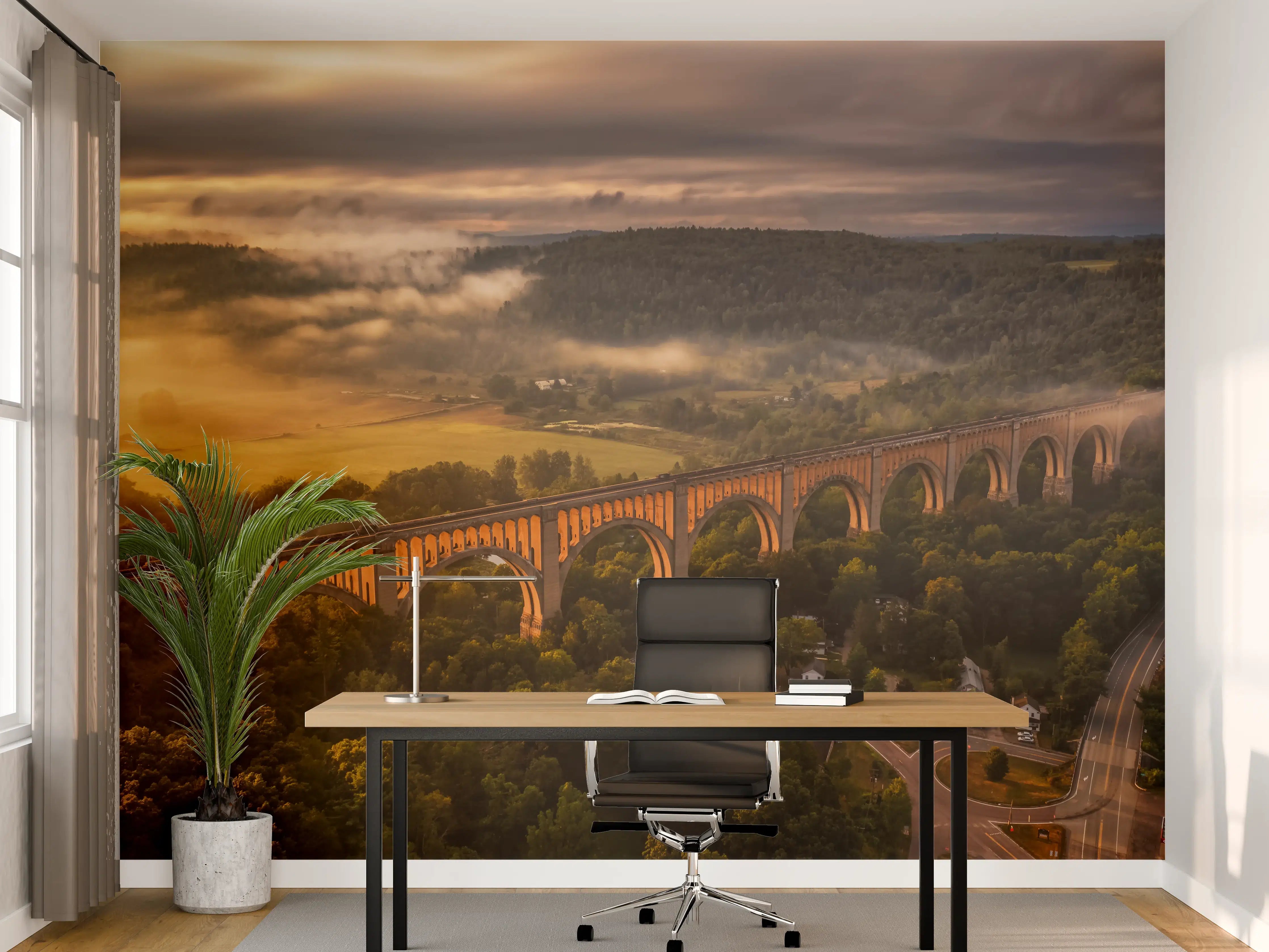 Büro Wandgestaltung - Sonnenaufgang über einer alten Eisenbahnbrücke im Grünen