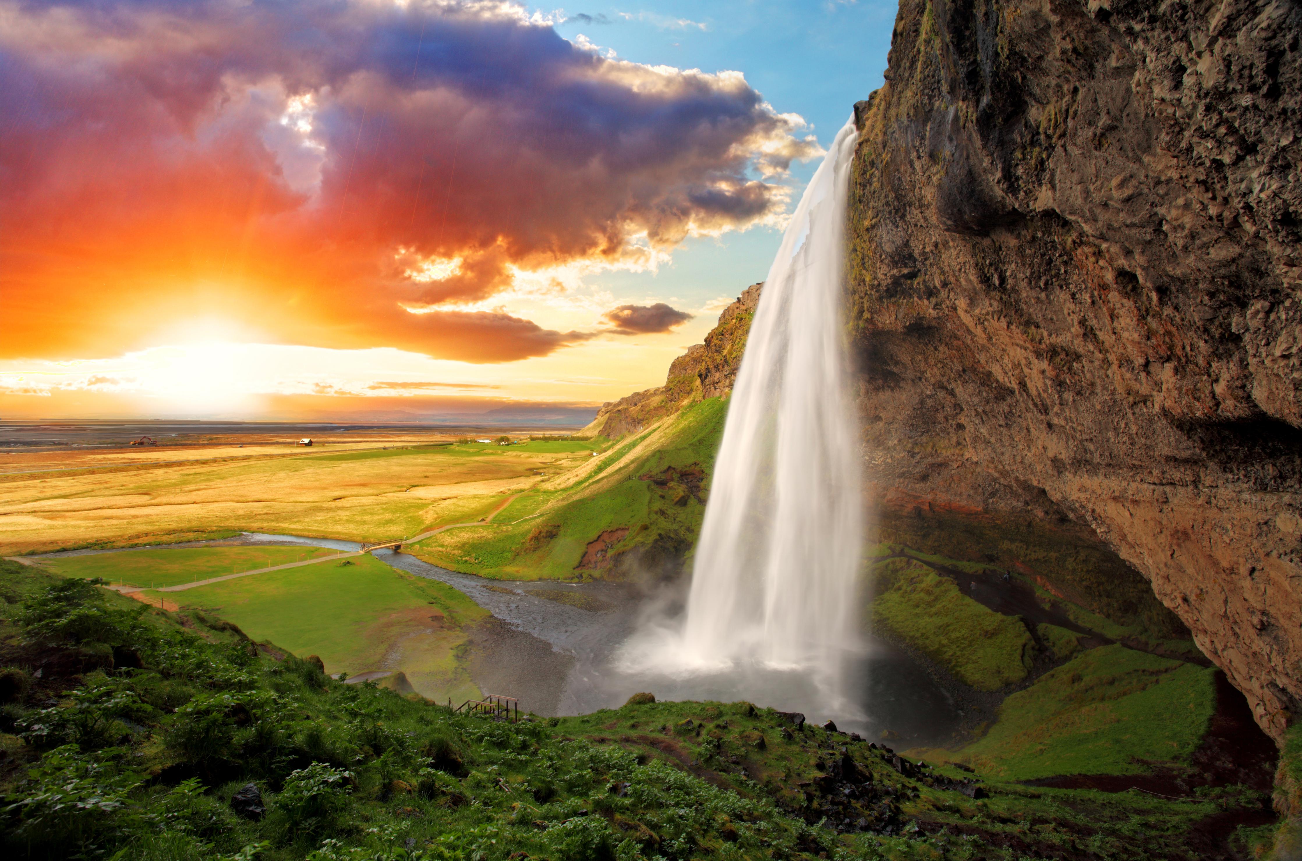 Duschrückwand- Seljalandsfoss Wasserfall bei Sonnenuntergang