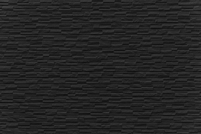 Duschrückwand - Schwarzer Stein Ziegel Textur und Hintergrund