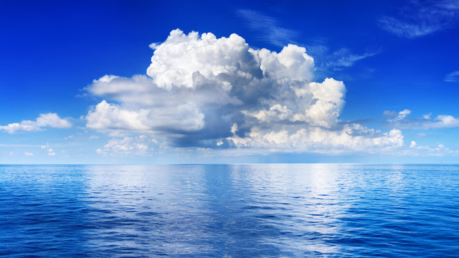 Duschrückwand - Wolkenkulisse über dem Ozean