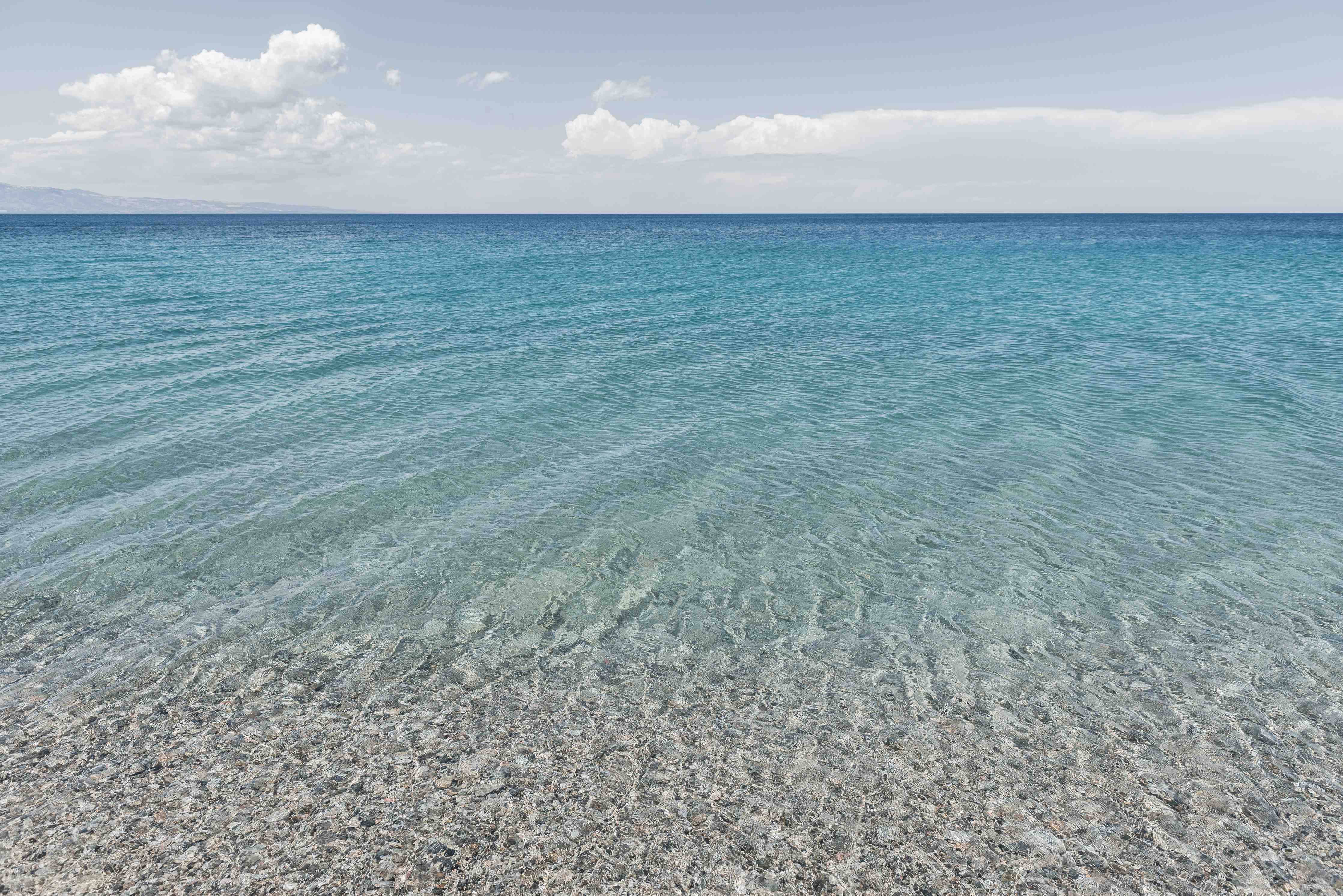 Große Wandbilder-Blaue Meeresbucht mit Sandstrand