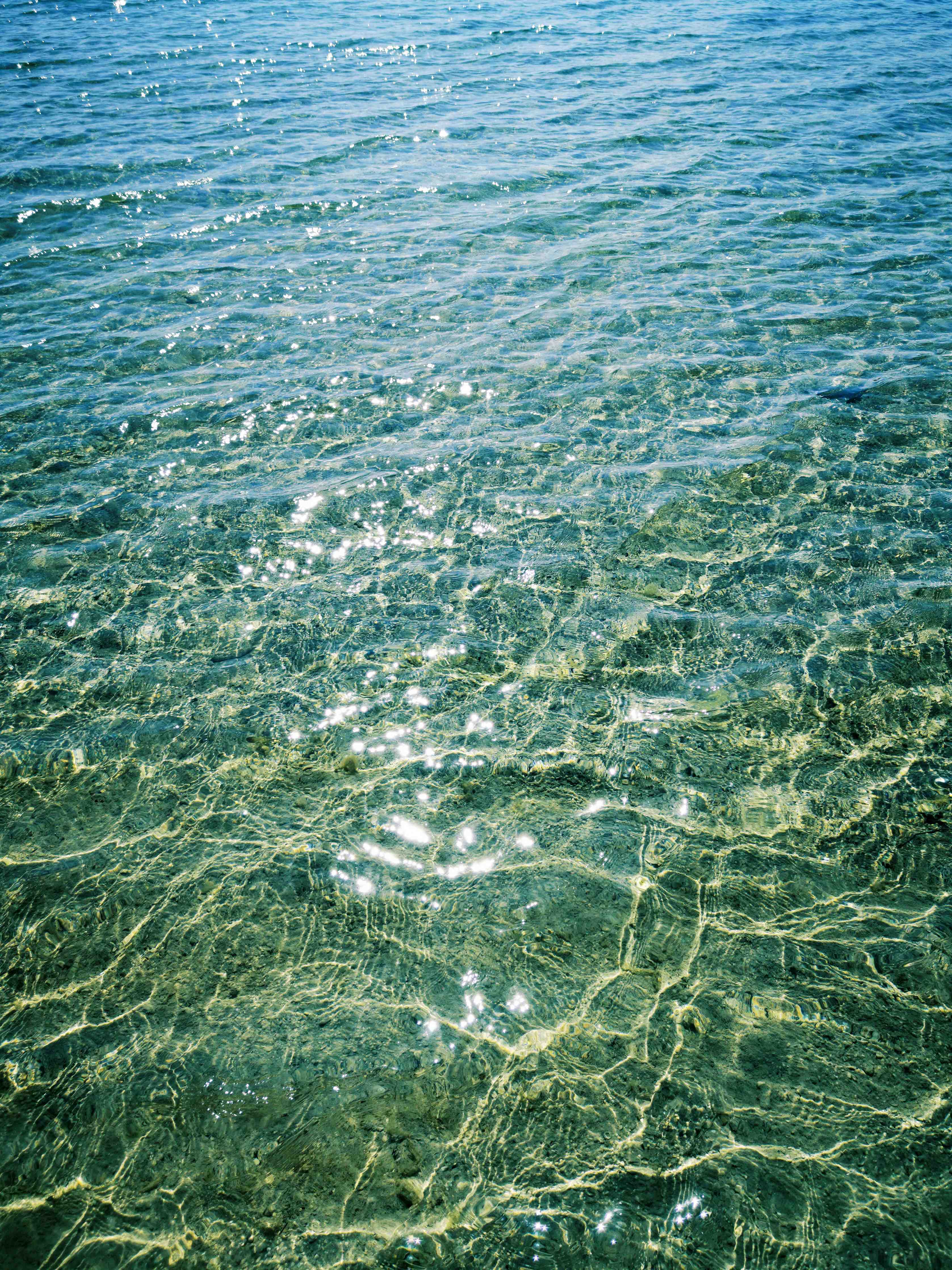Große Wandbilder-Kristallklares Wasser mit Sonnenreflexen