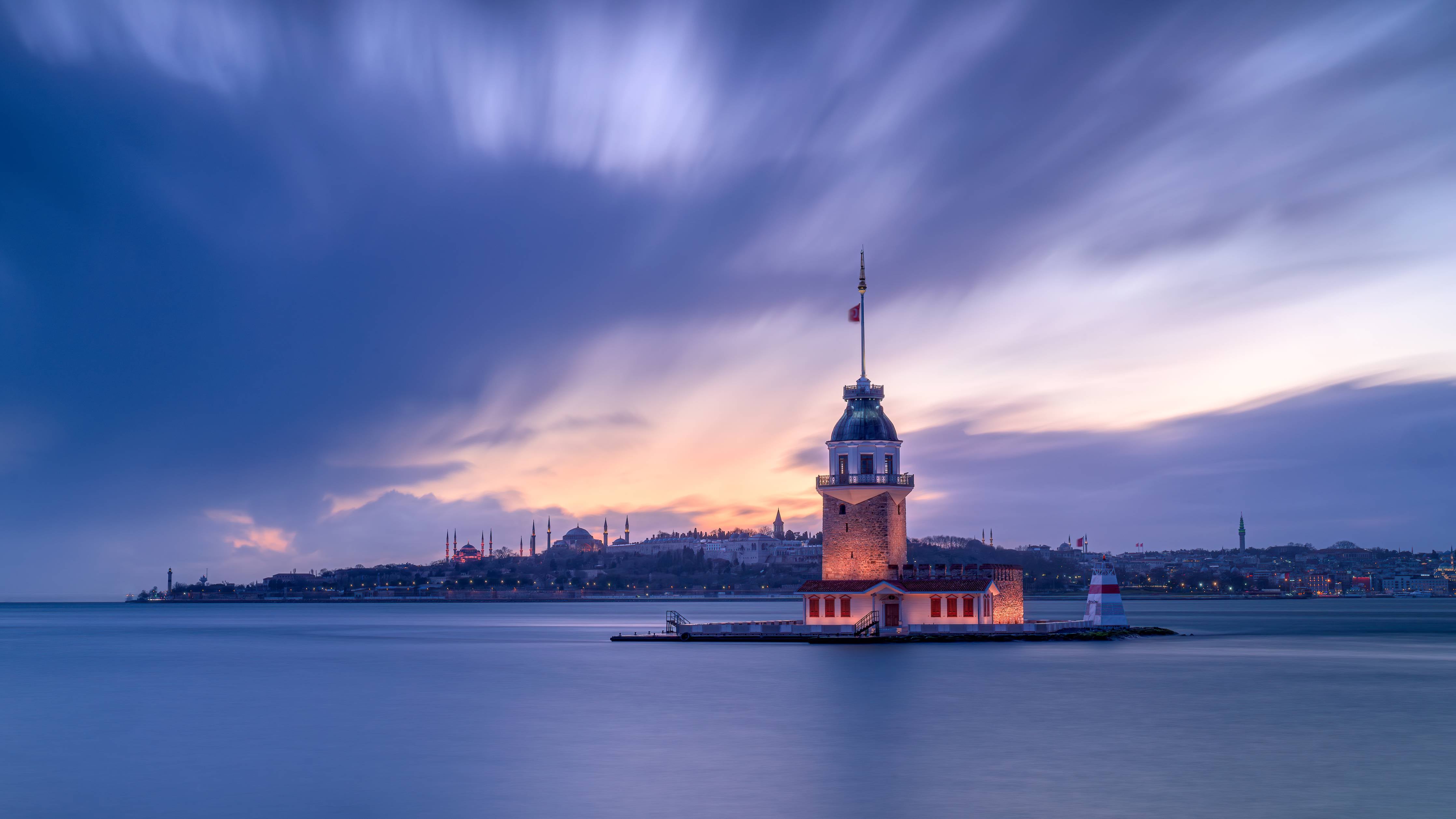 Große Wandbilder-Leuchtturm bei Sonnenuntergang mit dramatischem Himmel