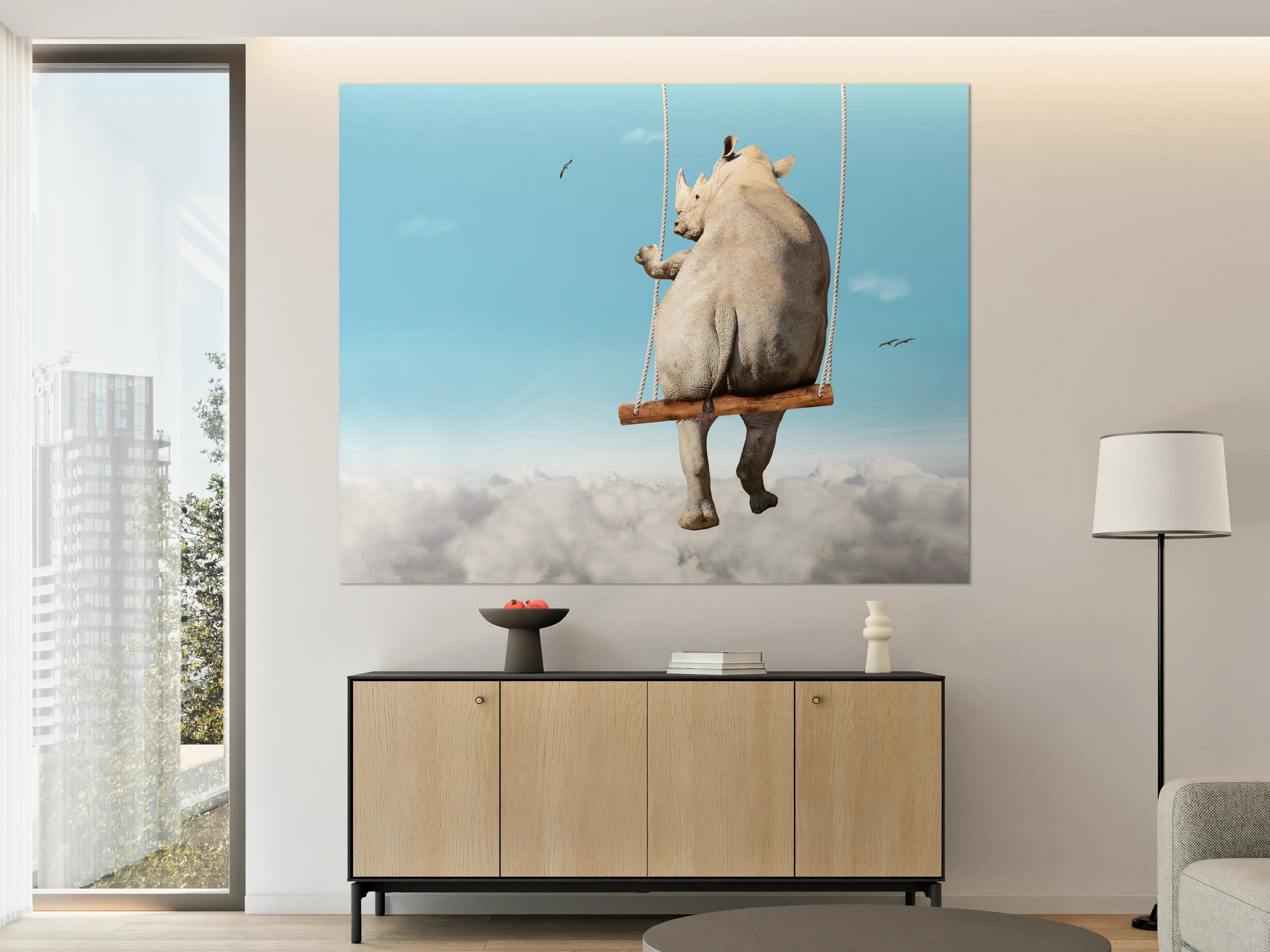 Große Wandbilder - Nashorn schaukelt über den Wolken