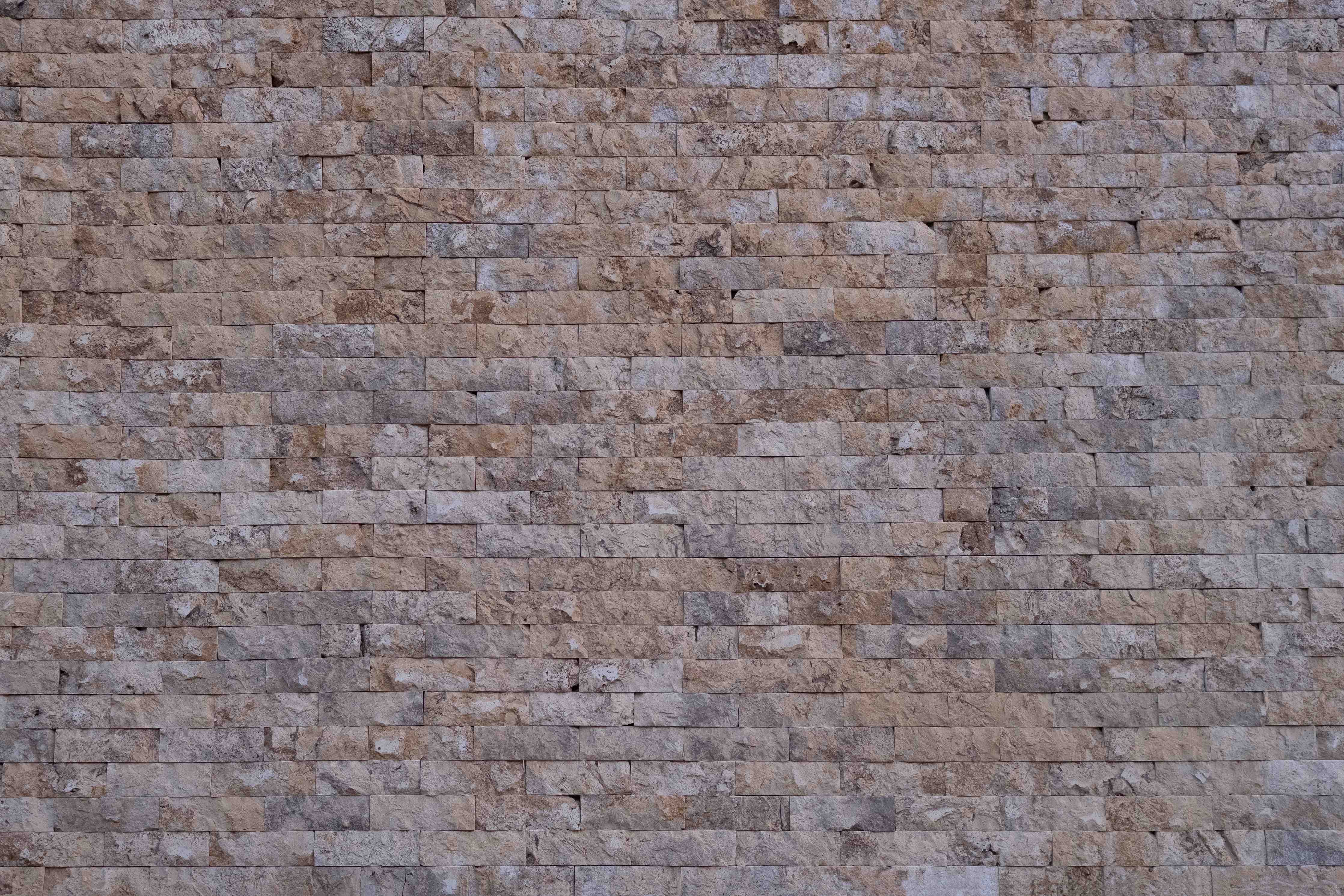 Große Wandbilder-Rustikale Steinmauer mit erdigen Tönen