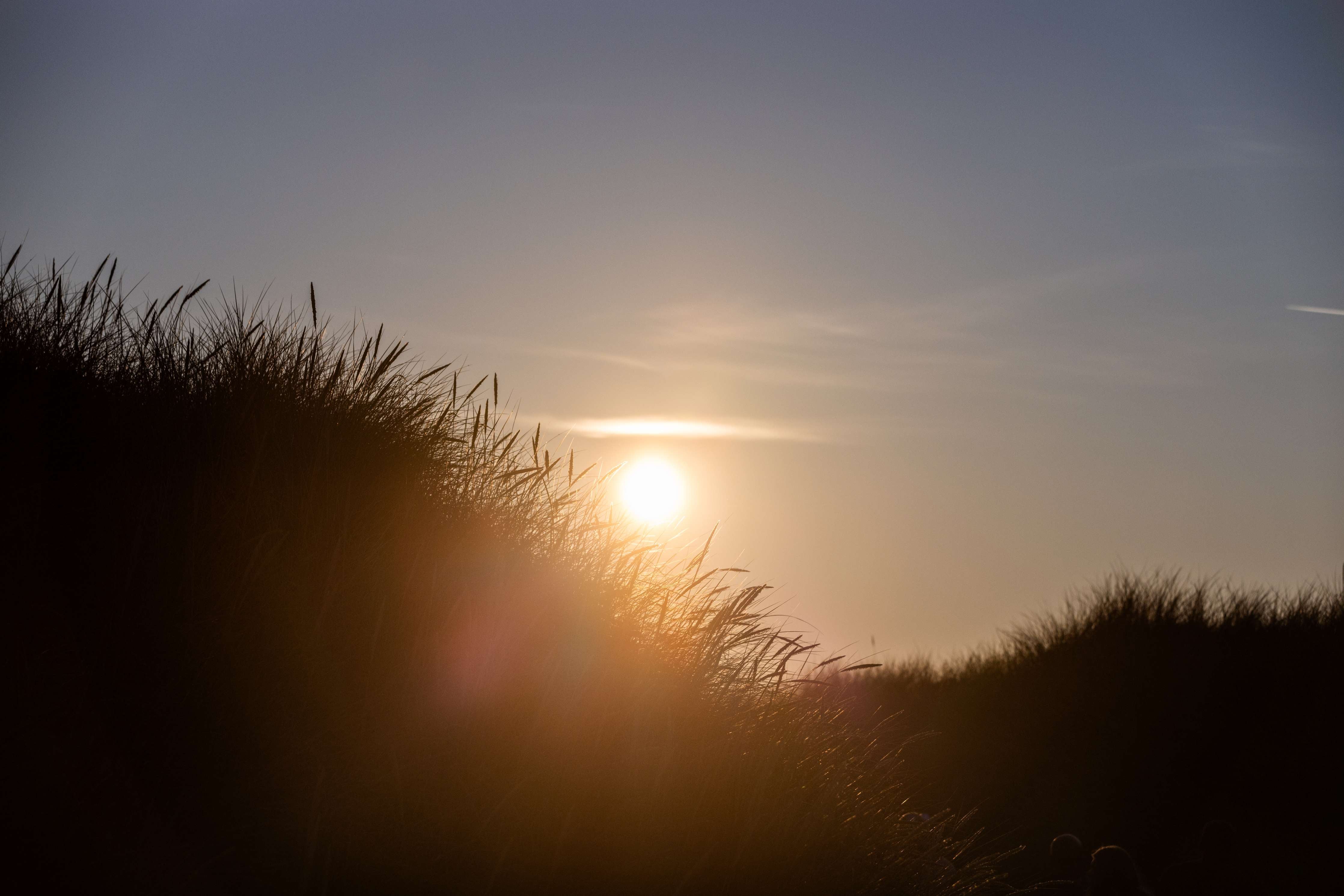 Große Wandbilder-Sonnenuntergang über den Dünen mit warmem Licht