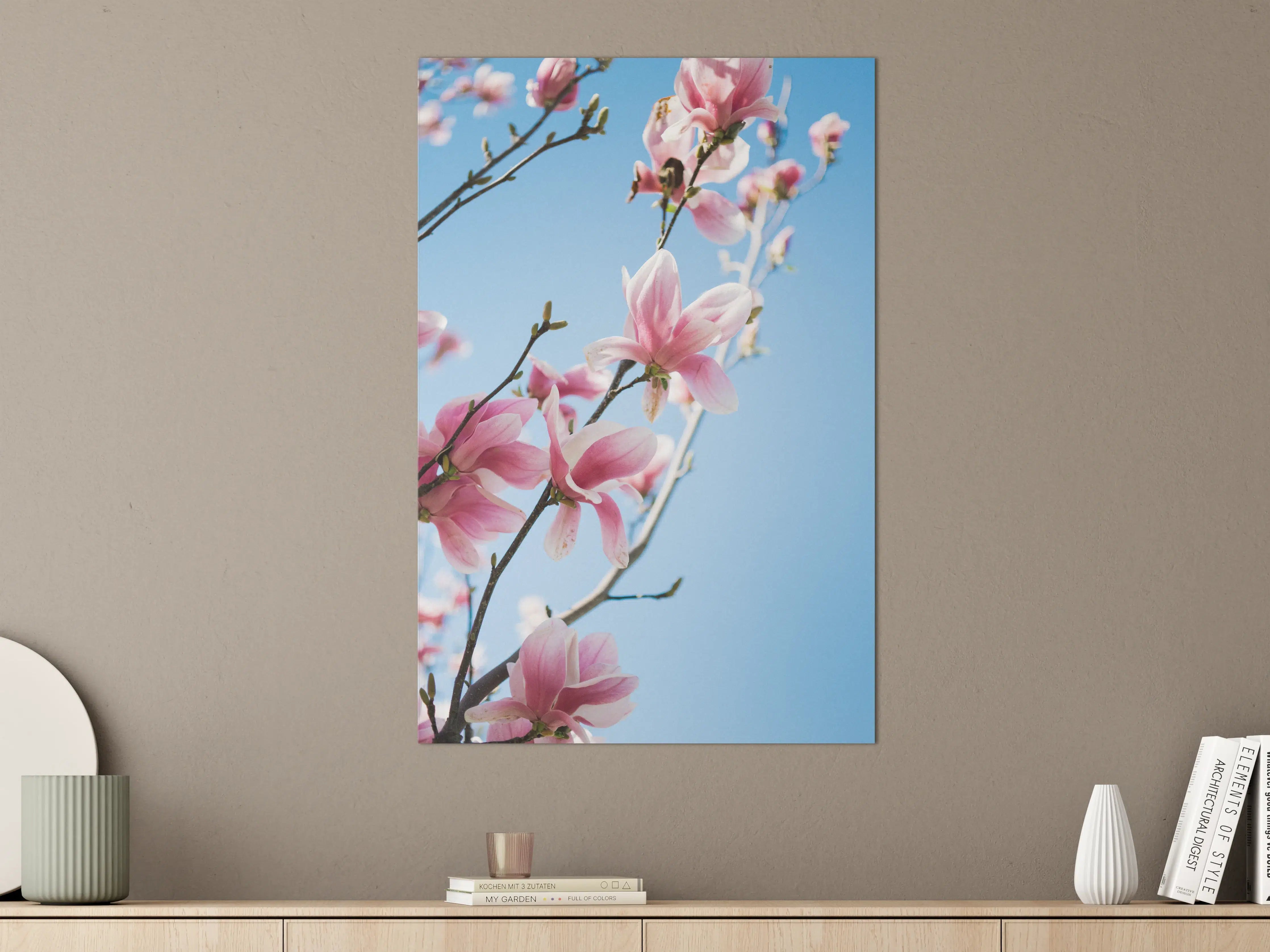 Große Wandbilder - Zartrosa Magnolienblüten vor blauem Himmel
