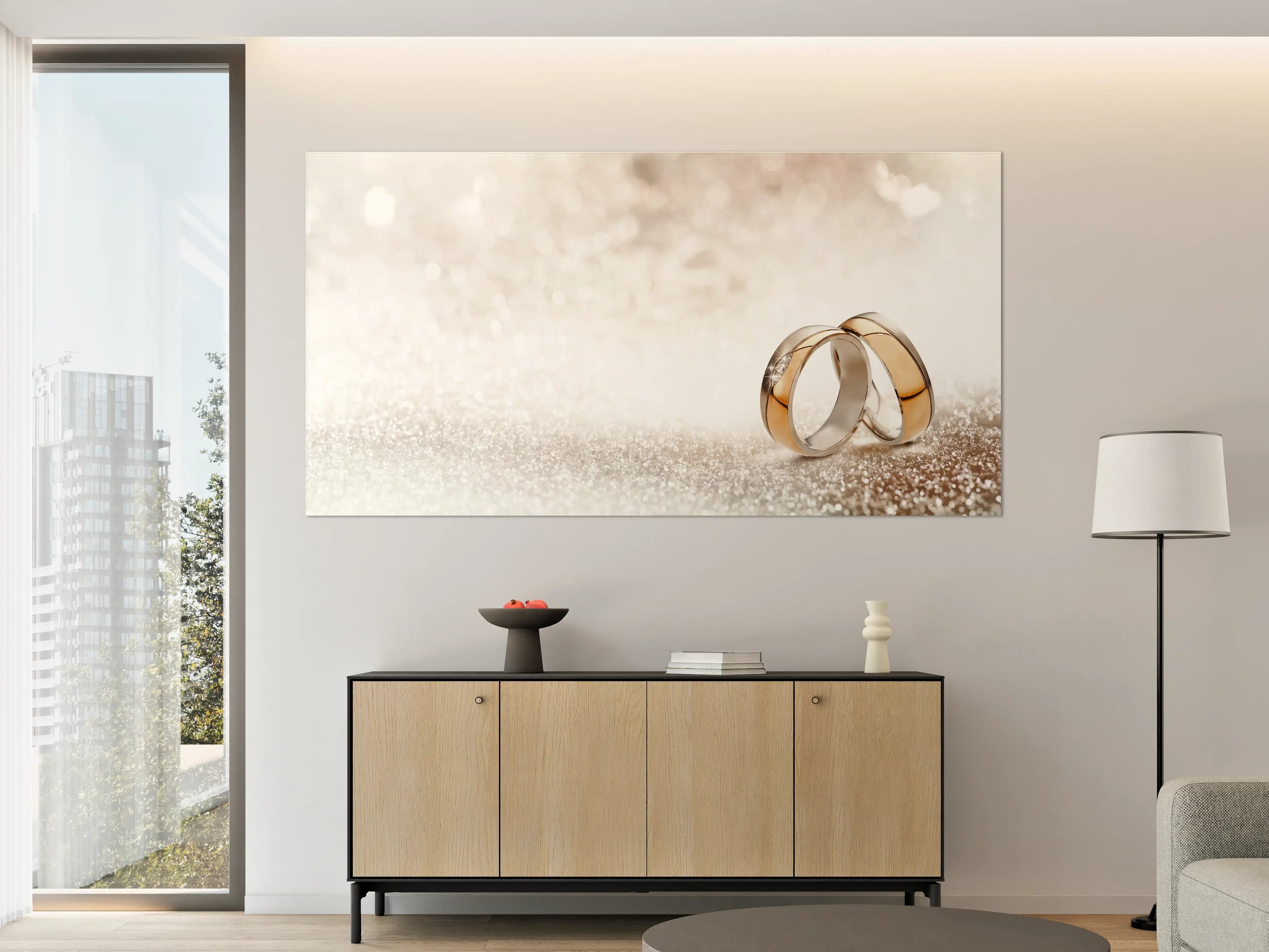 Große Wandbilder - Zwei goldene Eheringe mit Glitter Hintergrund