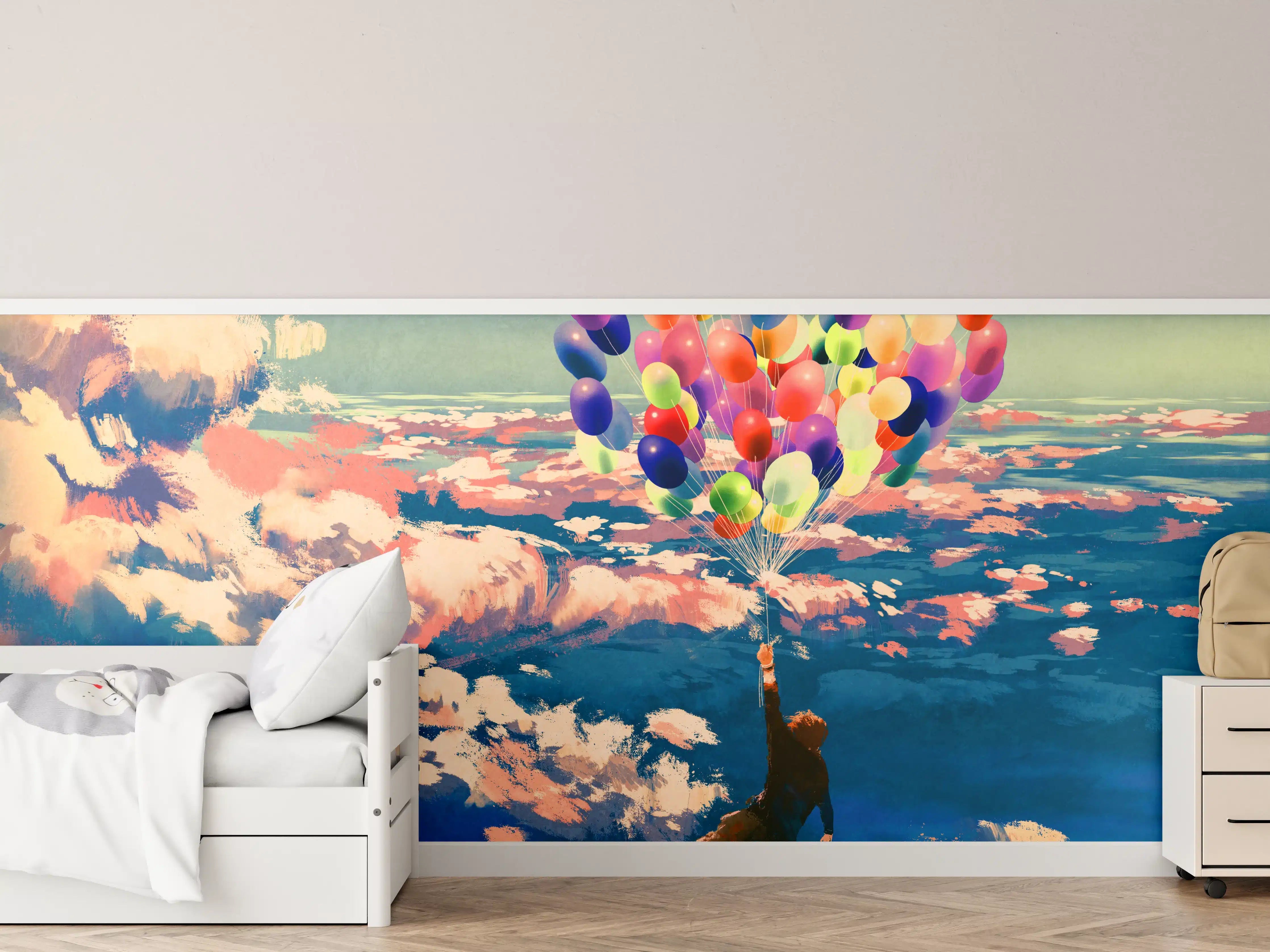 Kinderzimmer Wandgestaltung - Mann fliegt mit bunten Luftballons über Wolken