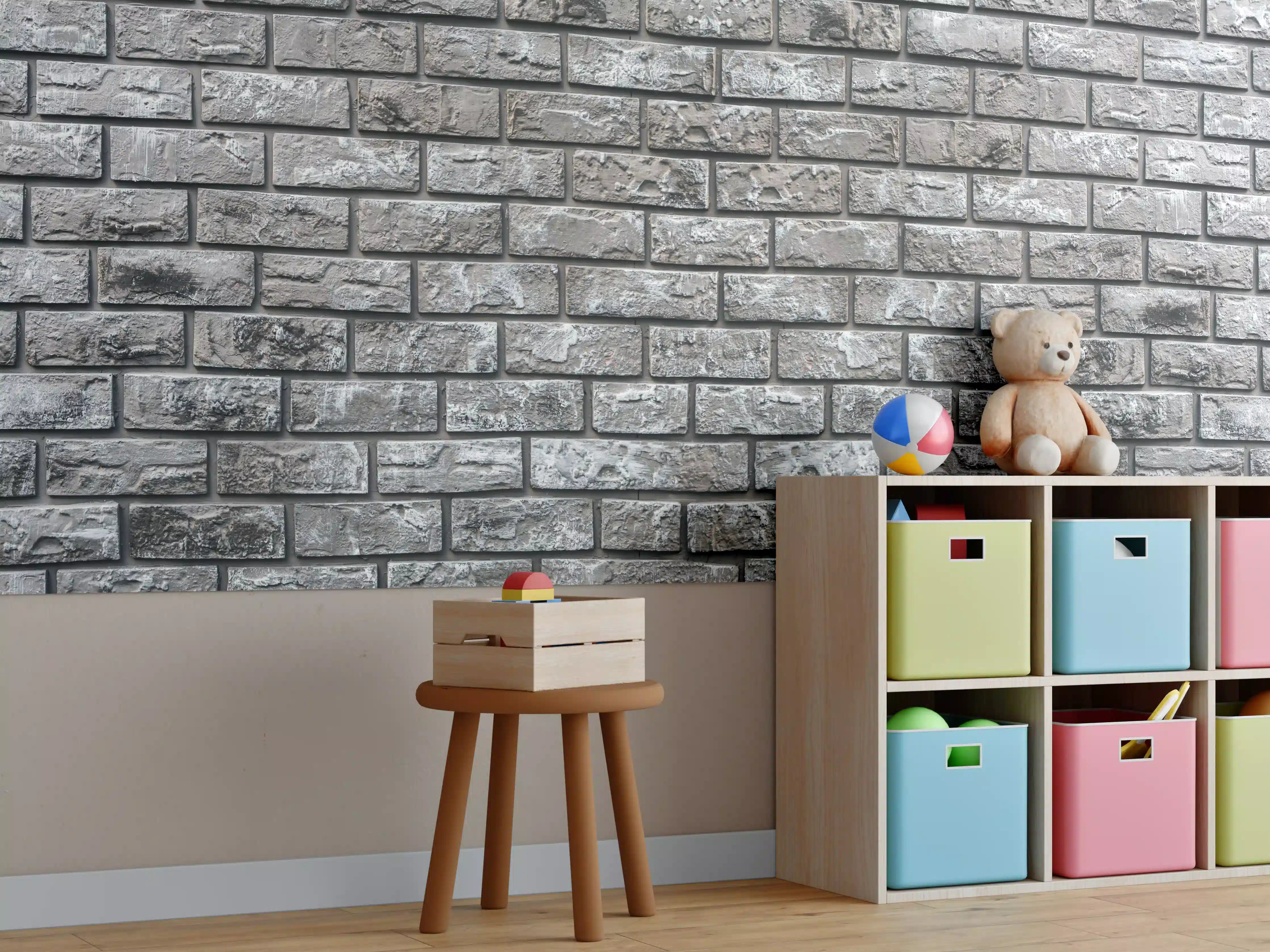 Kinderzimmer Wandgestaltung - Ziegelmauer aus dekorativem grauem Stein
