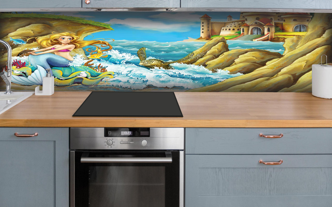 Küche - Kindermotiv - Meerjungfrau mit Aussicht auf Schloss hinter weißen Hochglanz-Küchenregalen und schwarzem Wasserhahn