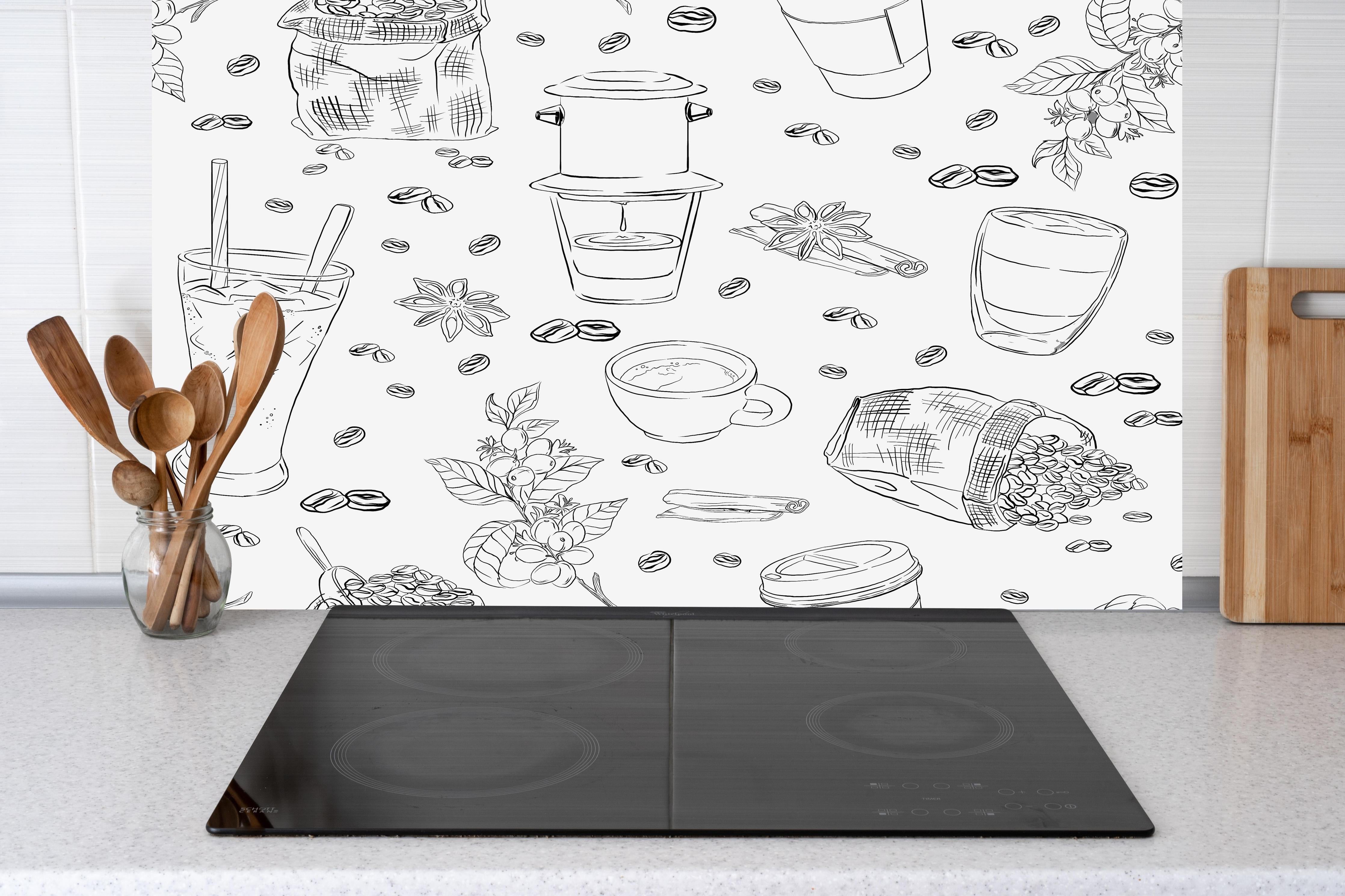 Küche - Kaffee & Gewürze Schwarz-Weiß hinter Cerankochfeld und Holz-Kochutensilien