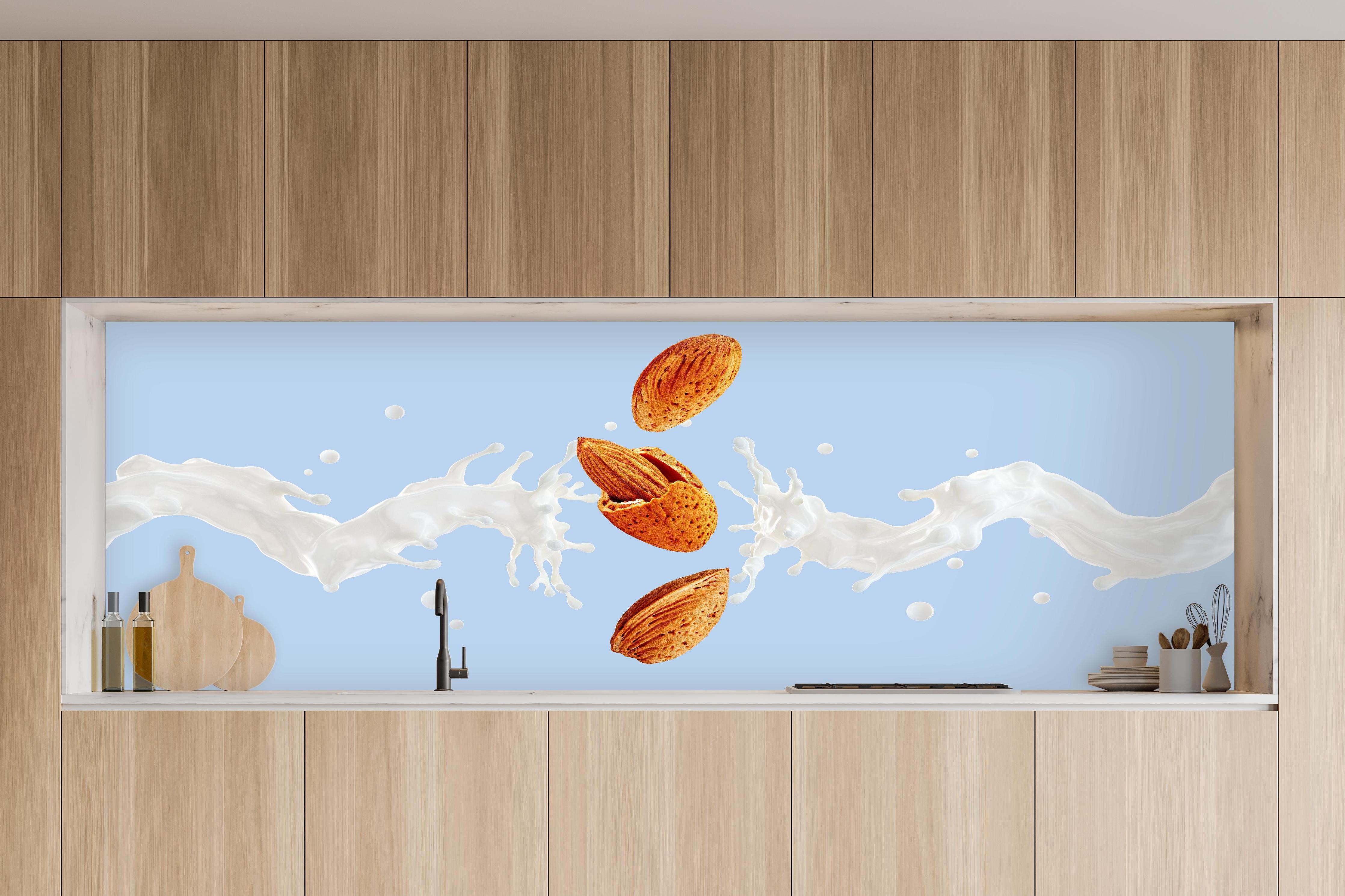 Küche - Mandelmilch-Splash auf Blau in charakteristischer Vollholz-Küche mit modernem Gasherd