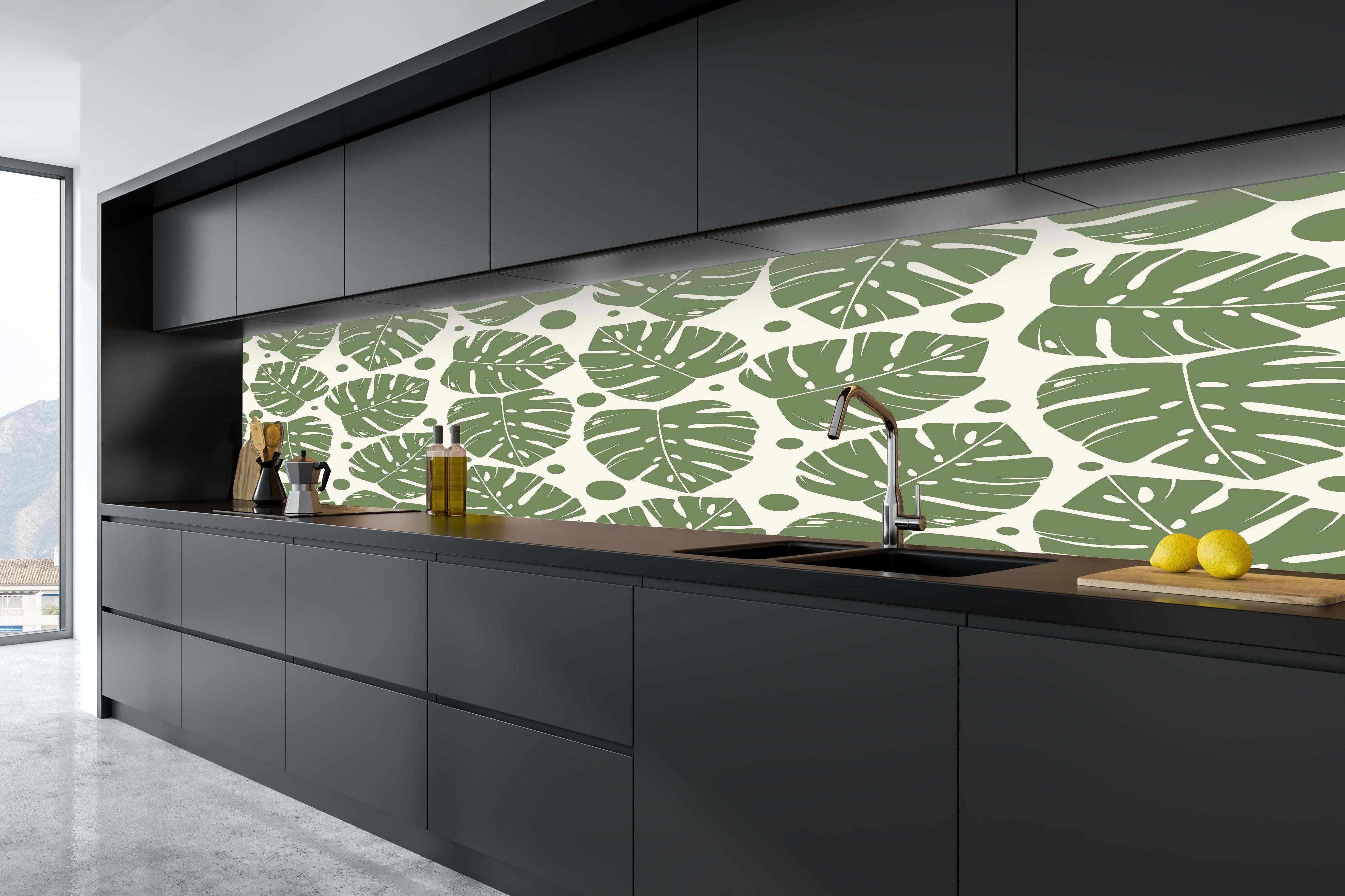 Küche - Monstera-Blätter Cremegrün in tiefschwarzer matt-premium Einbauküche
