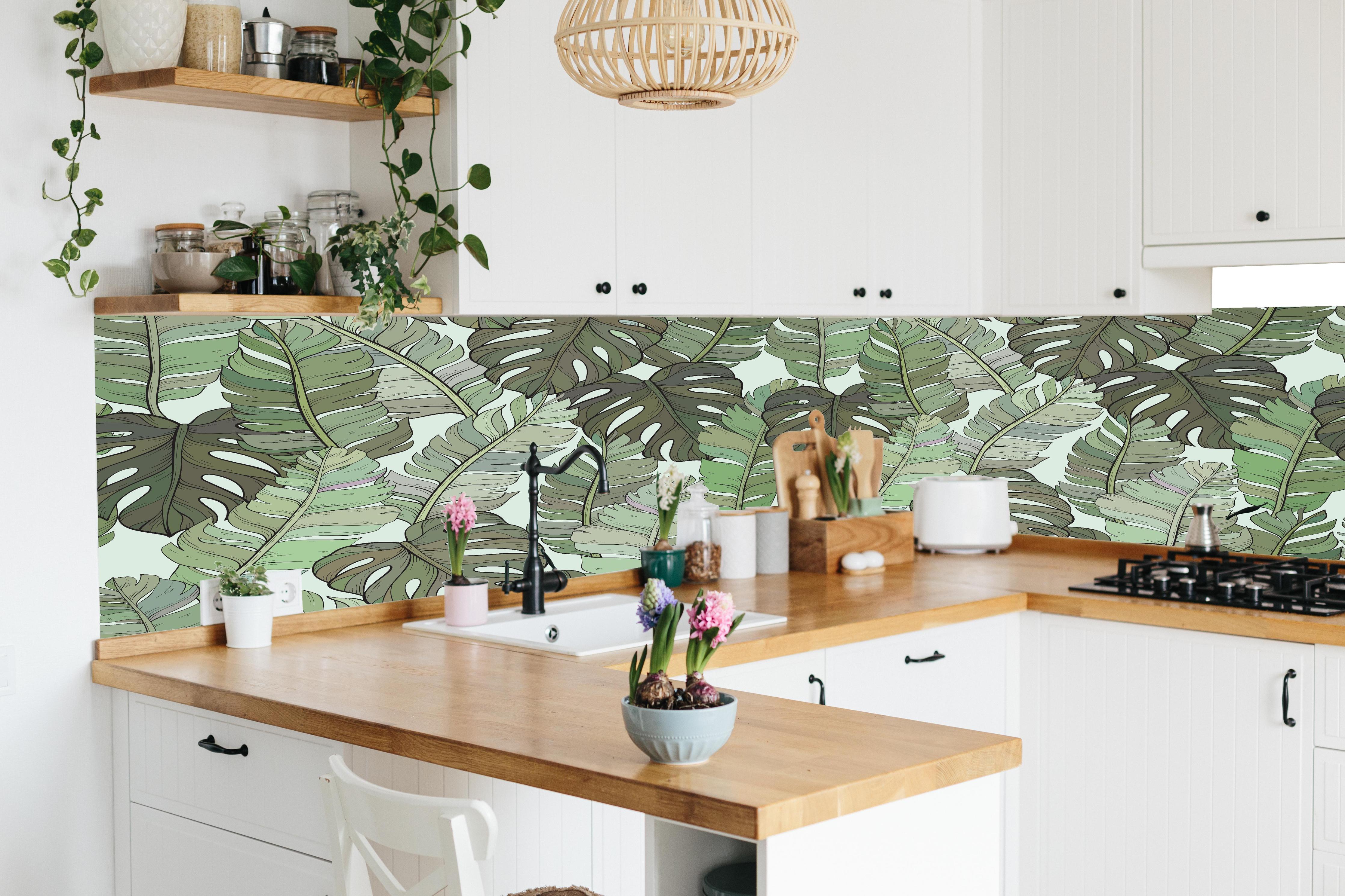 Küche - Monstera-Blätter – Tropische Eleganz in lebendiger Küche mit bunten Blumen