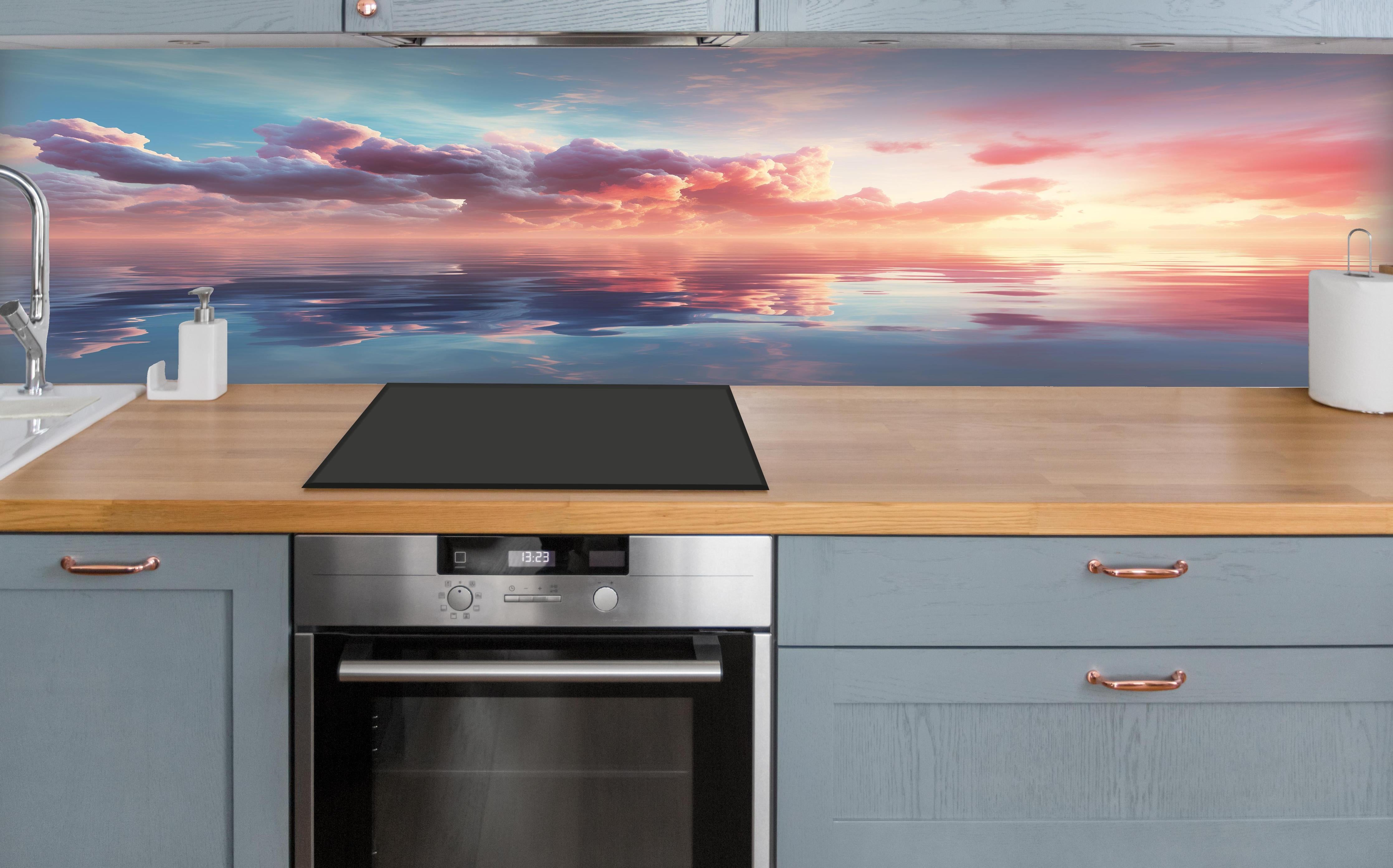 Küche - Pastell-Sonnenuntergang über Meer über polierter Holzarbeitsplatte mit Cerankochfeld