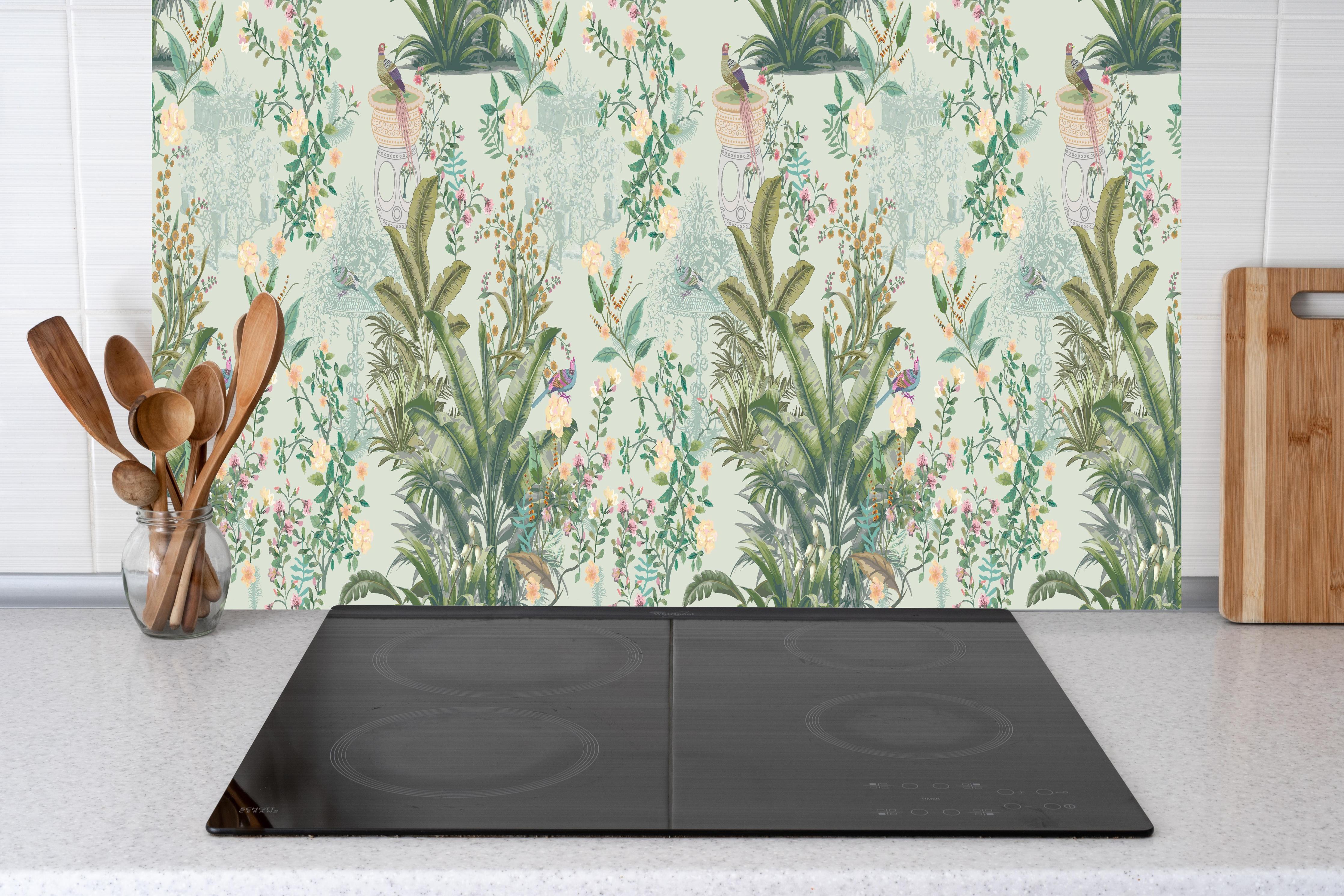 Küche - Vintage Bloom Grünes Refugium hinter Cerankochfeld und Holz-Kochutensilien