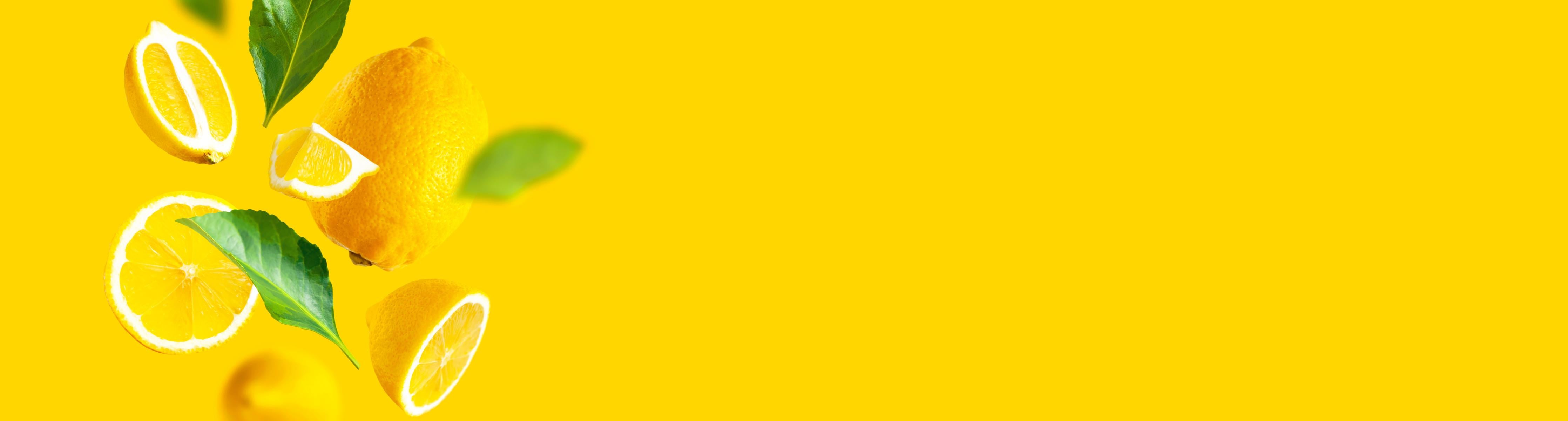 Küchenrückwand-Zitronen Limetten Gelber Hintergrund