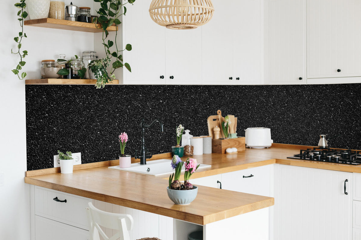 Küche - Anthrazitfarbenes Oberflächenpanorama in lebendiger Küche mit bunten Blumen