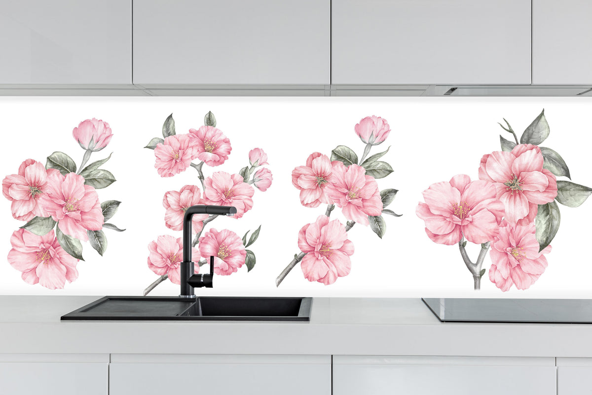 Küche - Aquarellelemente von blühenden Sakura hinter weißen Hochglanz-Küchenregalen und schwarzem Wasserhahn