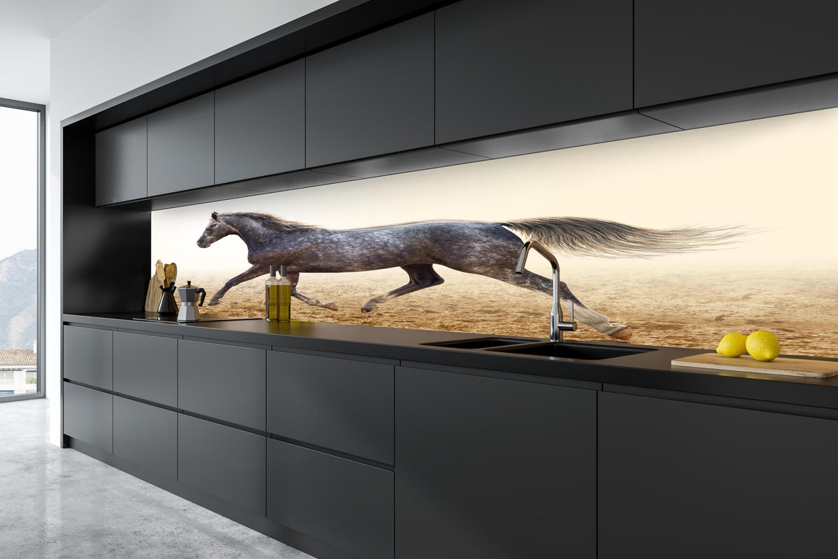 Küche - Ein graues Pferd reitend auf einem Feld in tiefschwarzer matt-premium Einbauküche