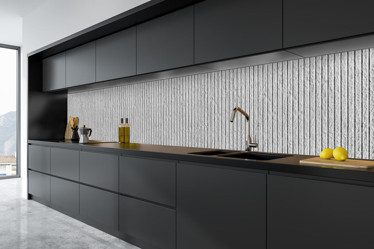 Küche - Panorama - moderne Zementwand in tiefschwarzer matt-premium Einbauküche