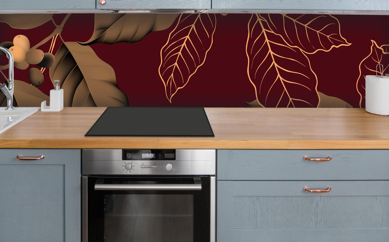 Küche - Rot-Braune Blätter über polierter Holzarbeitsplatte mit Cerankochfeld
