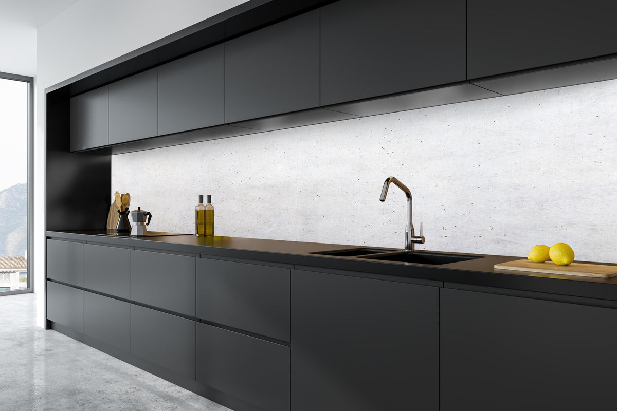 Küche - Textur einer weißen Betonwand in tiefschwarzer matt-premium Einbauküche