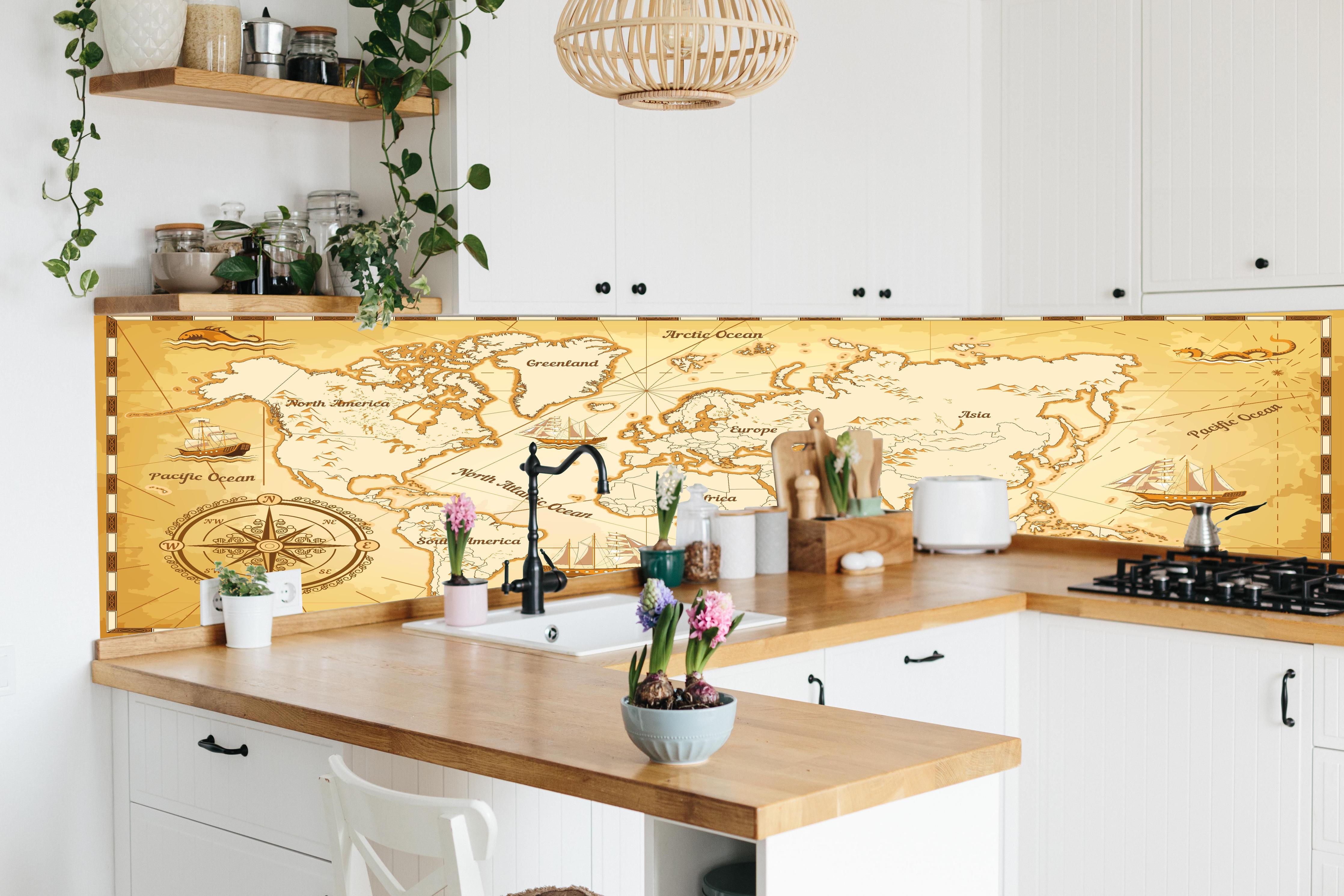 Küche - Stilisierte Vintage Weltkarte mit Segelschiffen hinter weißen Hochglanz-Küchenregalen und schwarzem Wasserhahn