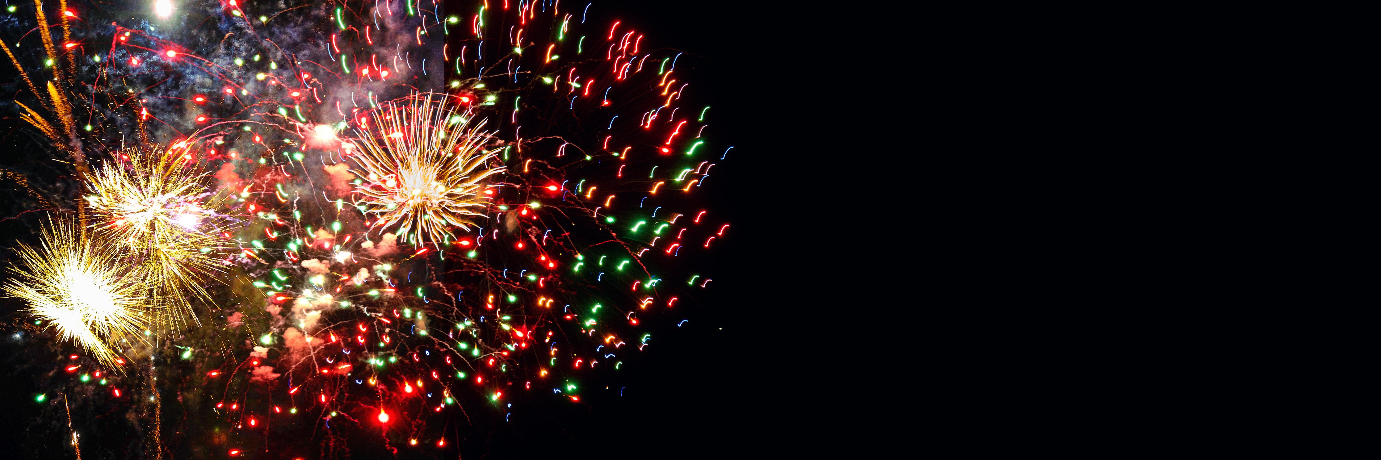 Spritzschutz-Feuerwerk Neujahr Bunt Nachthimmel