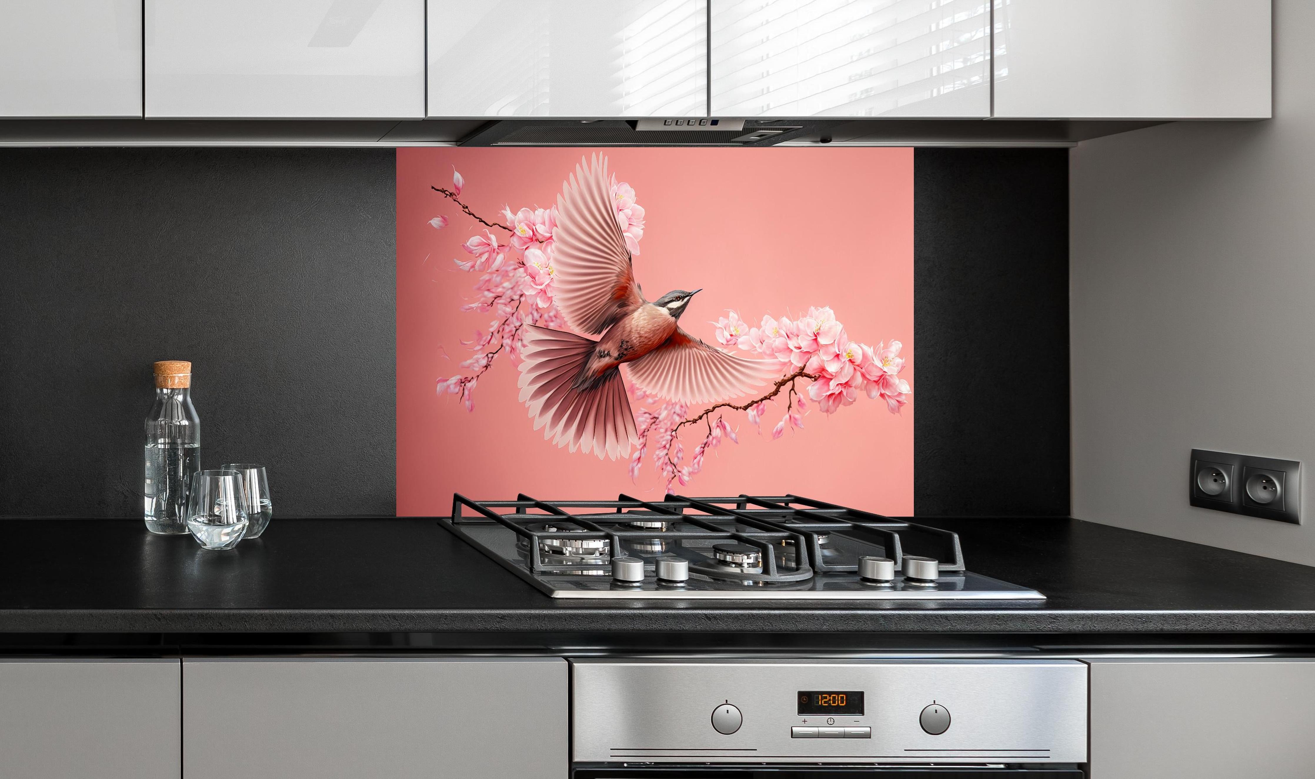 Spritzschutz - Fliegender Vogel Kirschblüten Sakura Pink hinter einem Cerankochfeld zwischen Holz-Kochutensilien
