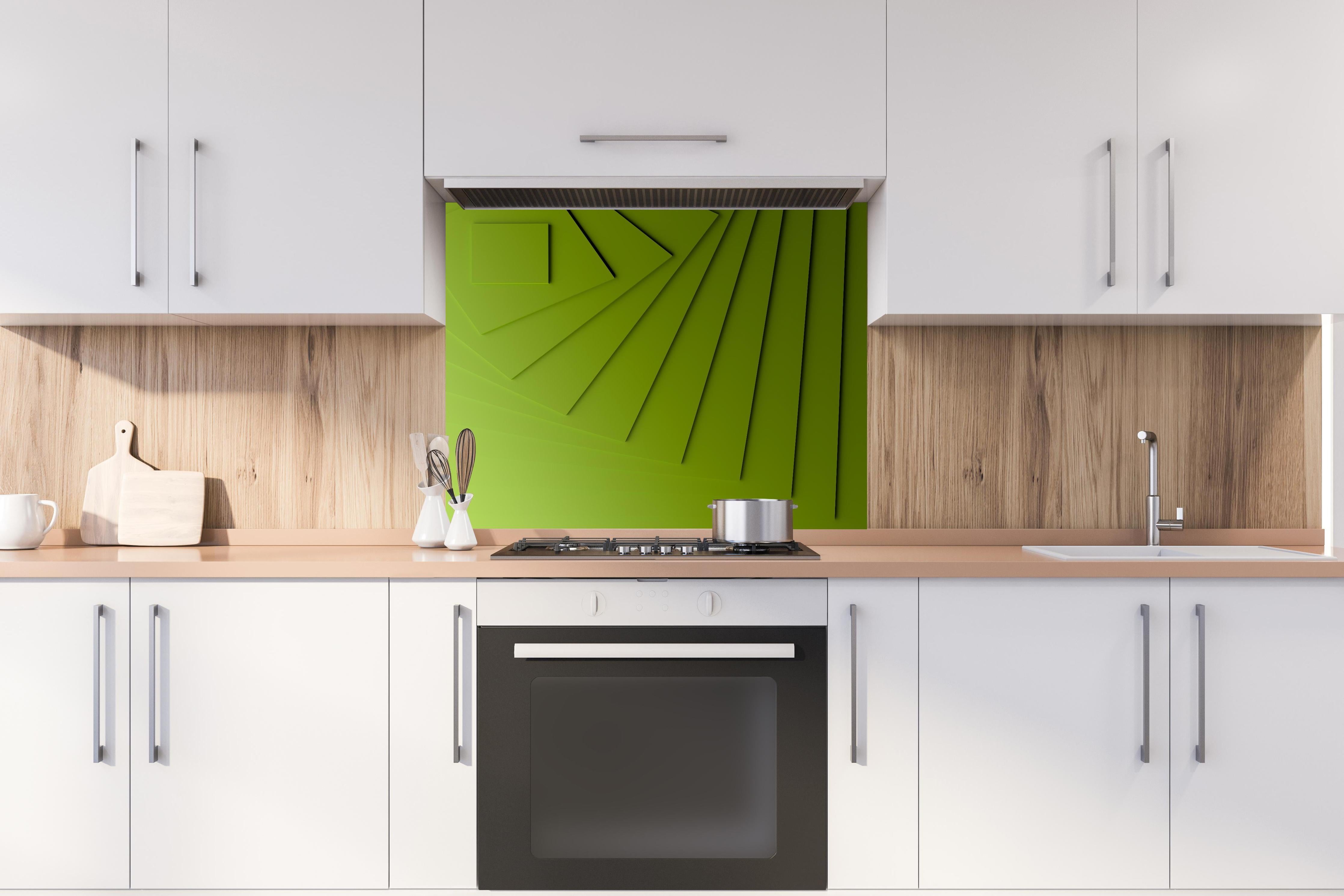 Spritzschutz - Grüner Moderner Hintergrund  hinter einem Cerankochfeld zwischen Holz-Kochutensilien
