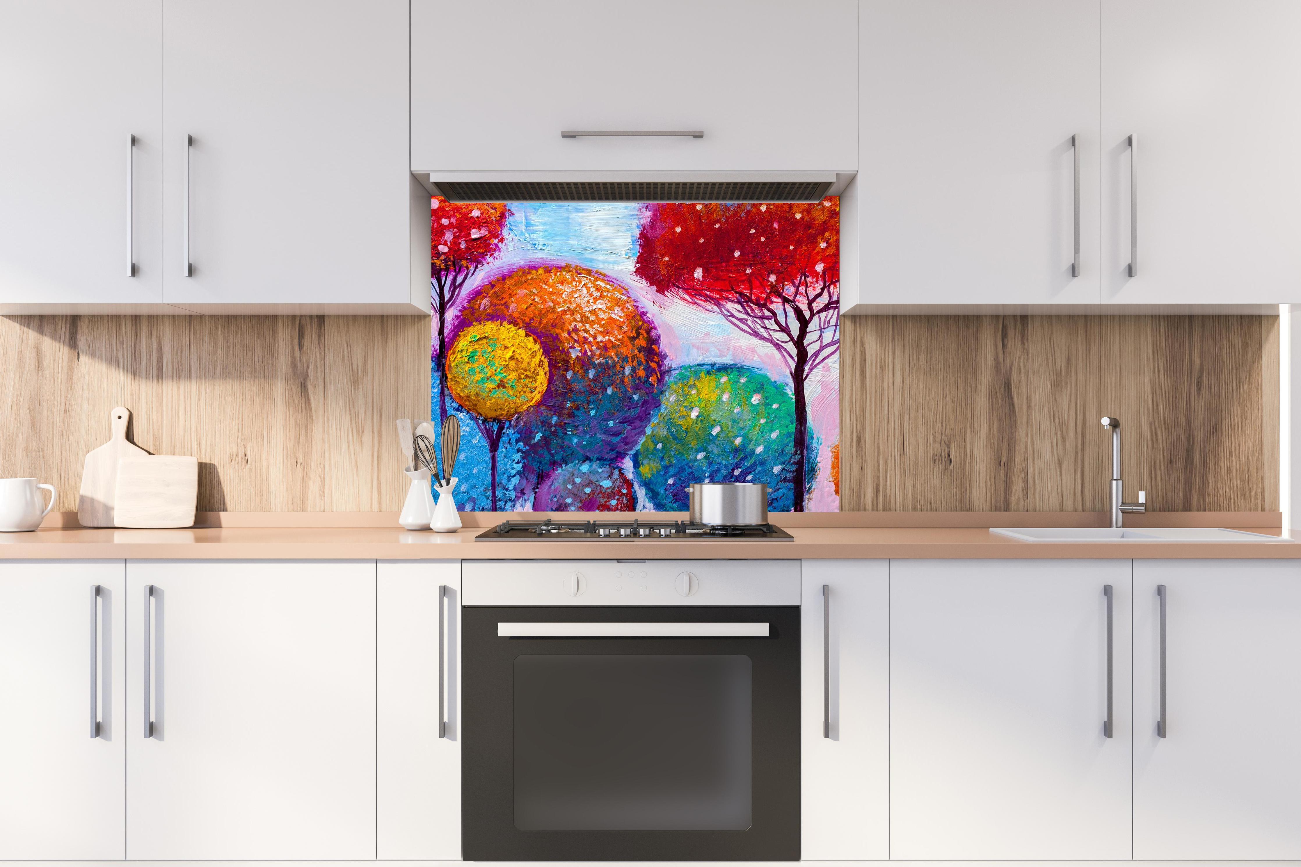 Spritzschutz - Abstrakte bunte Bäume hinter stilvollem Gasherd unter Dunstabzugshaube