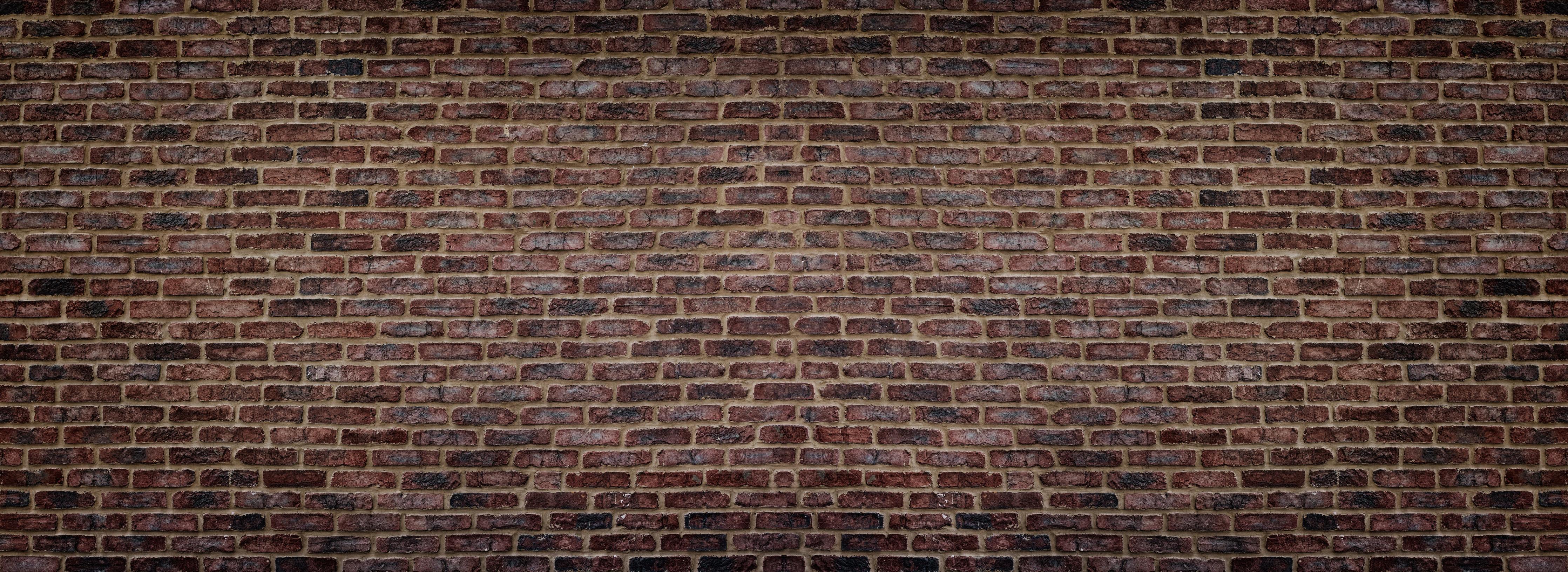 Spritzschutz-Alte rötliche Ziegelwand