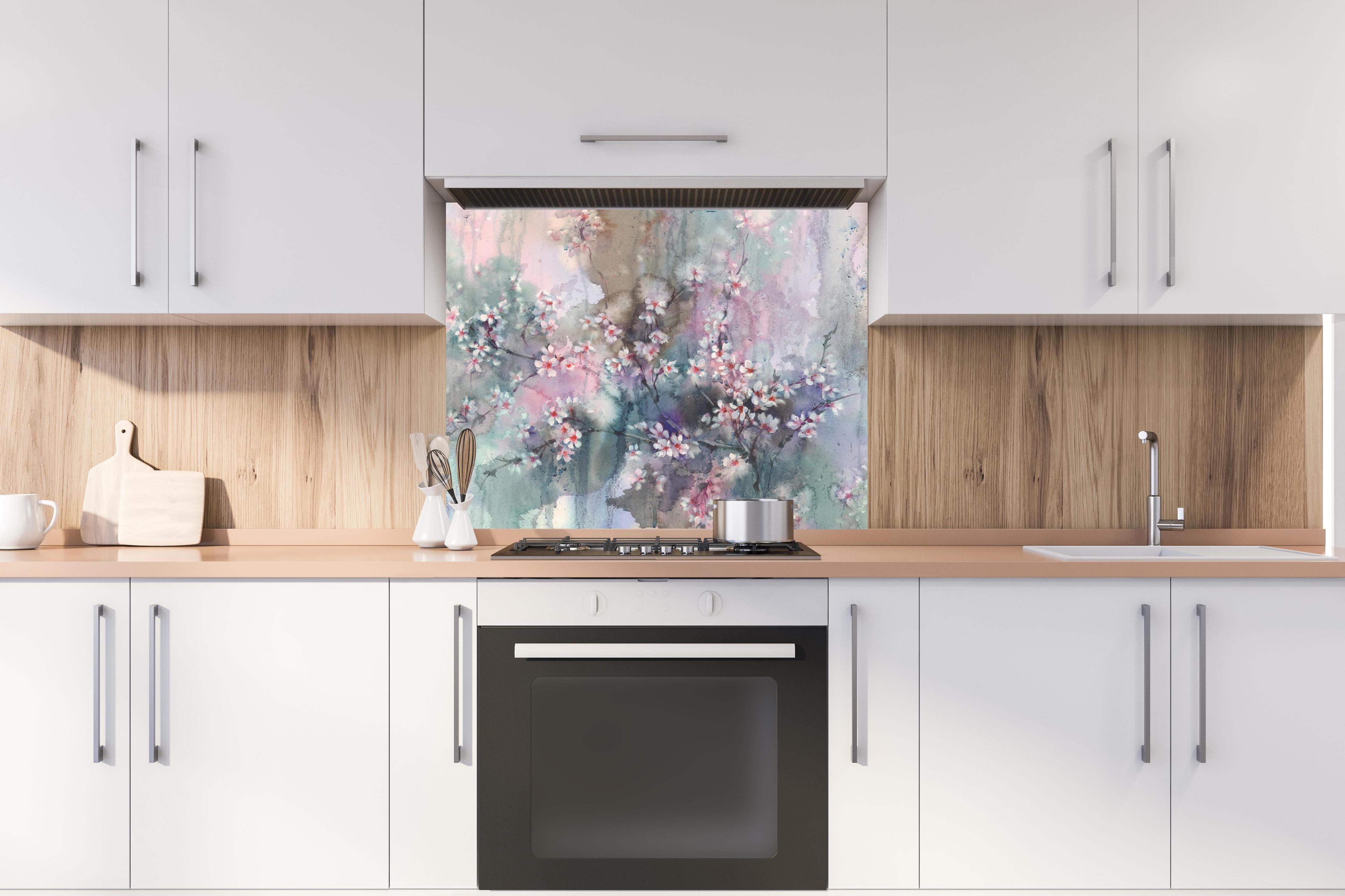 Spritzschutz - Japanische Kirchblüten mit Aquarell Muster hinter stilvollem Gasherd unter Dunstabzugshaube