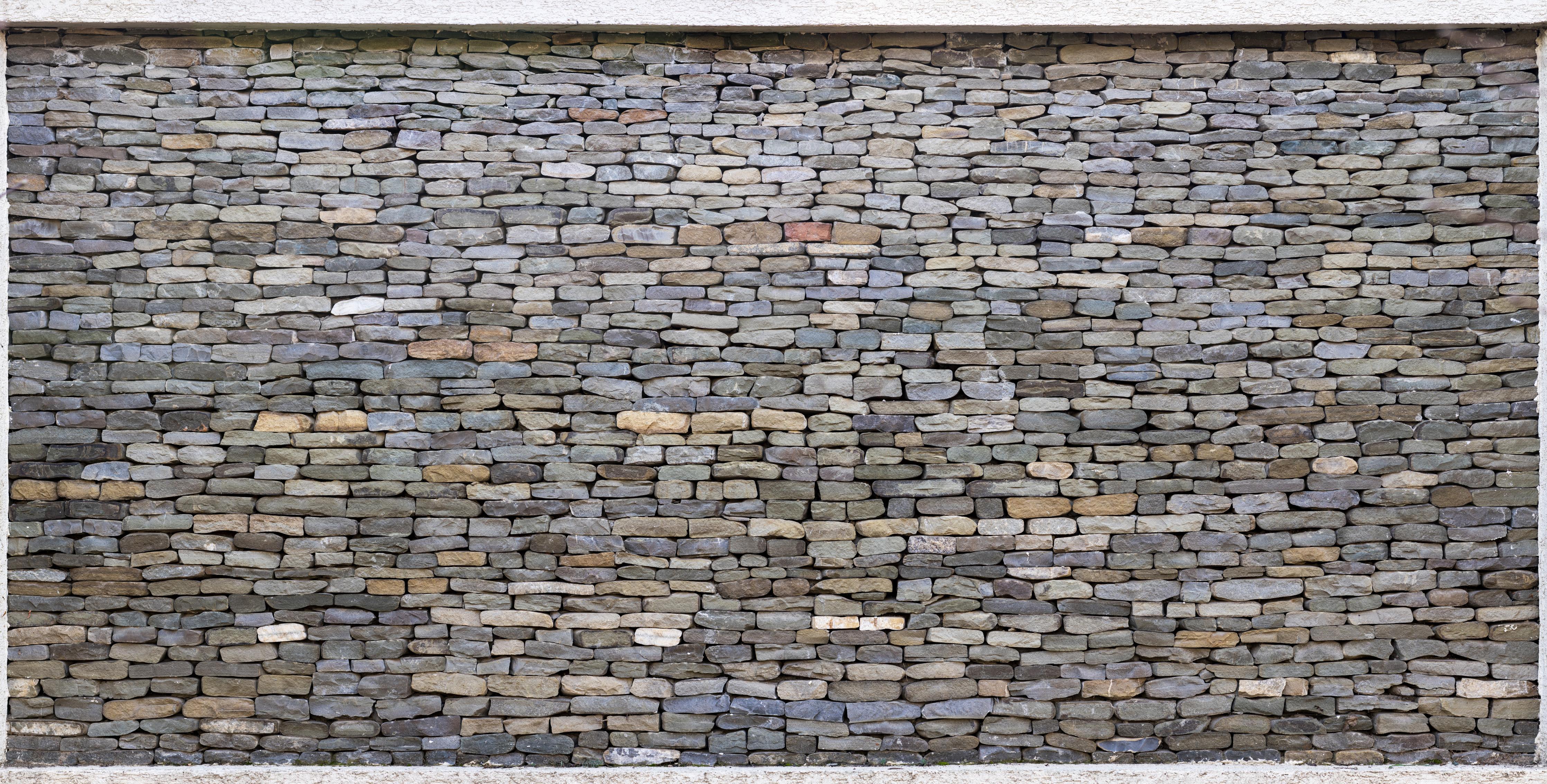 Spritzschutz-Pastellfarbene Steinmauer