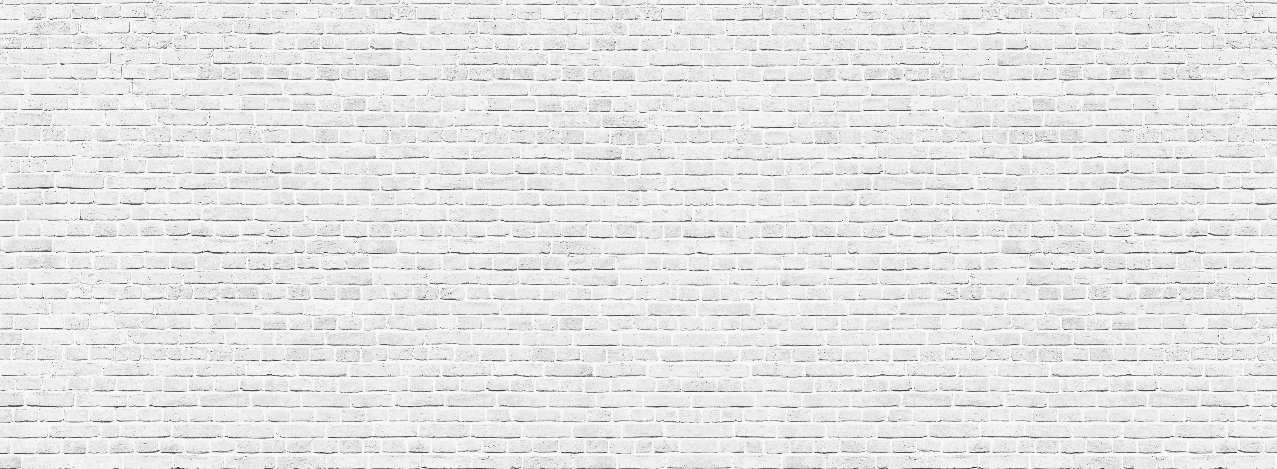 Spritzschutz-Weiß-Graue Backsteinmauer