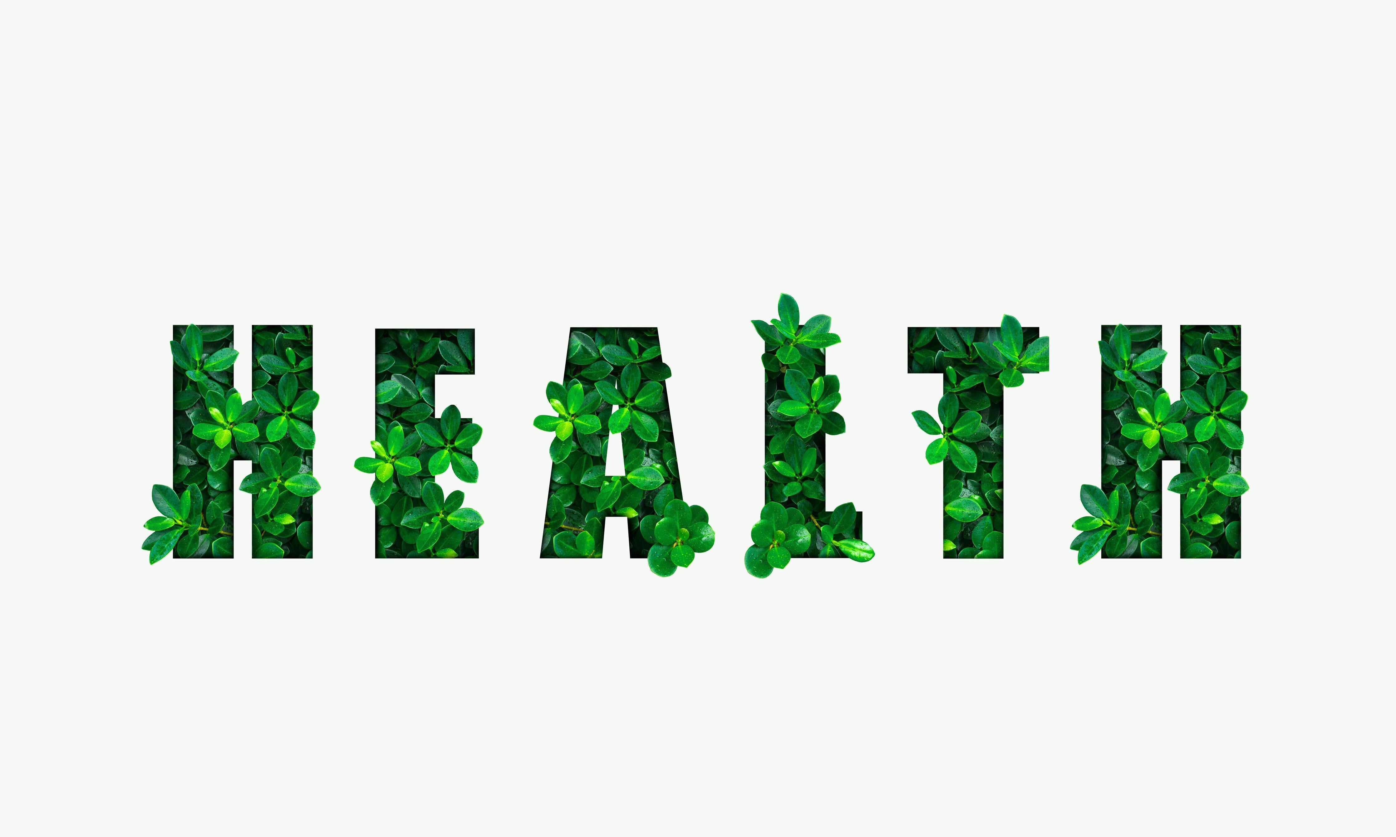 Spritzschutz-Wort HEALTH aus grünen Blättern