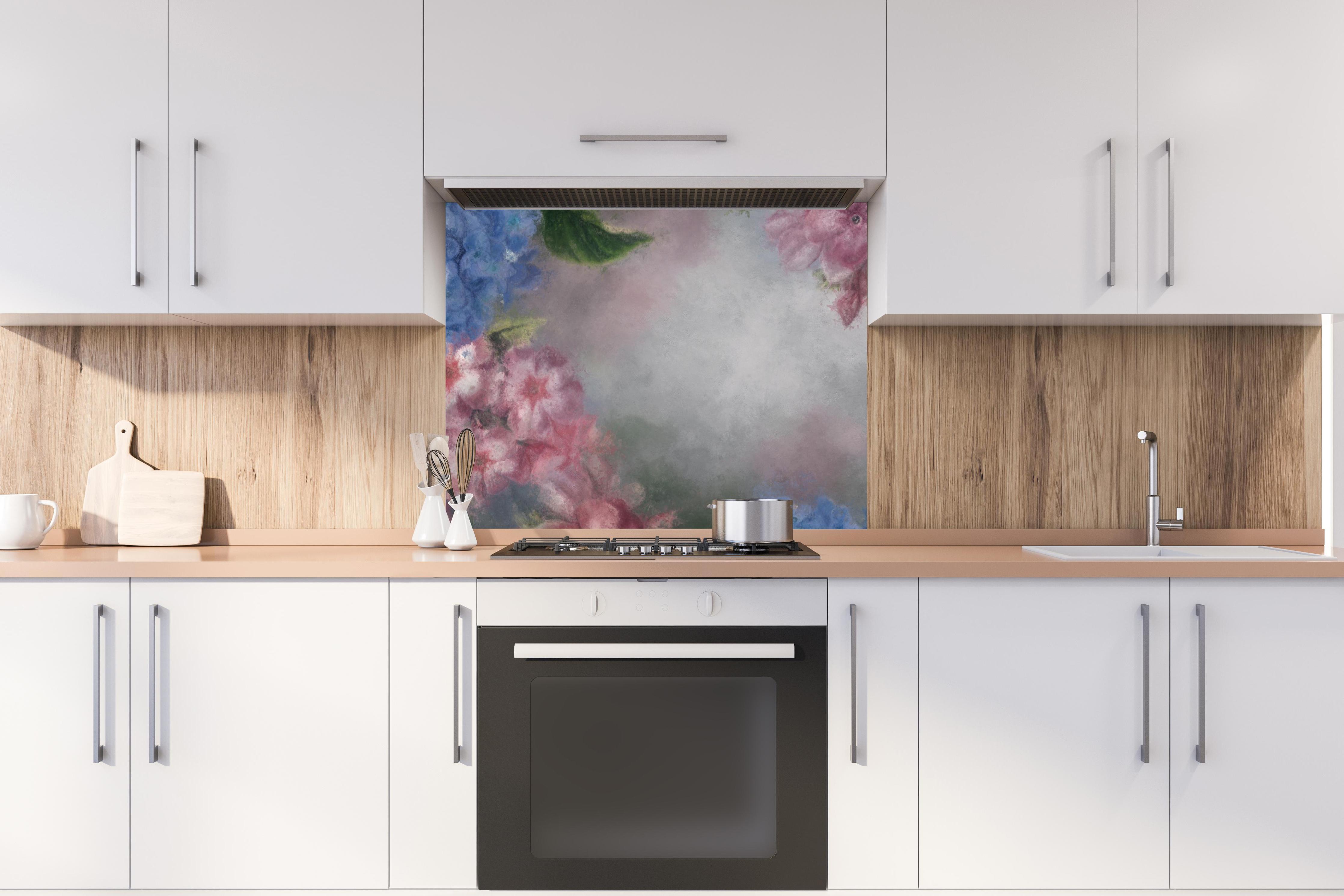 Spritzschutz - antiquarisches Blumengemälde hinter stilvollem Gasherd unter Dunstabzugshaube