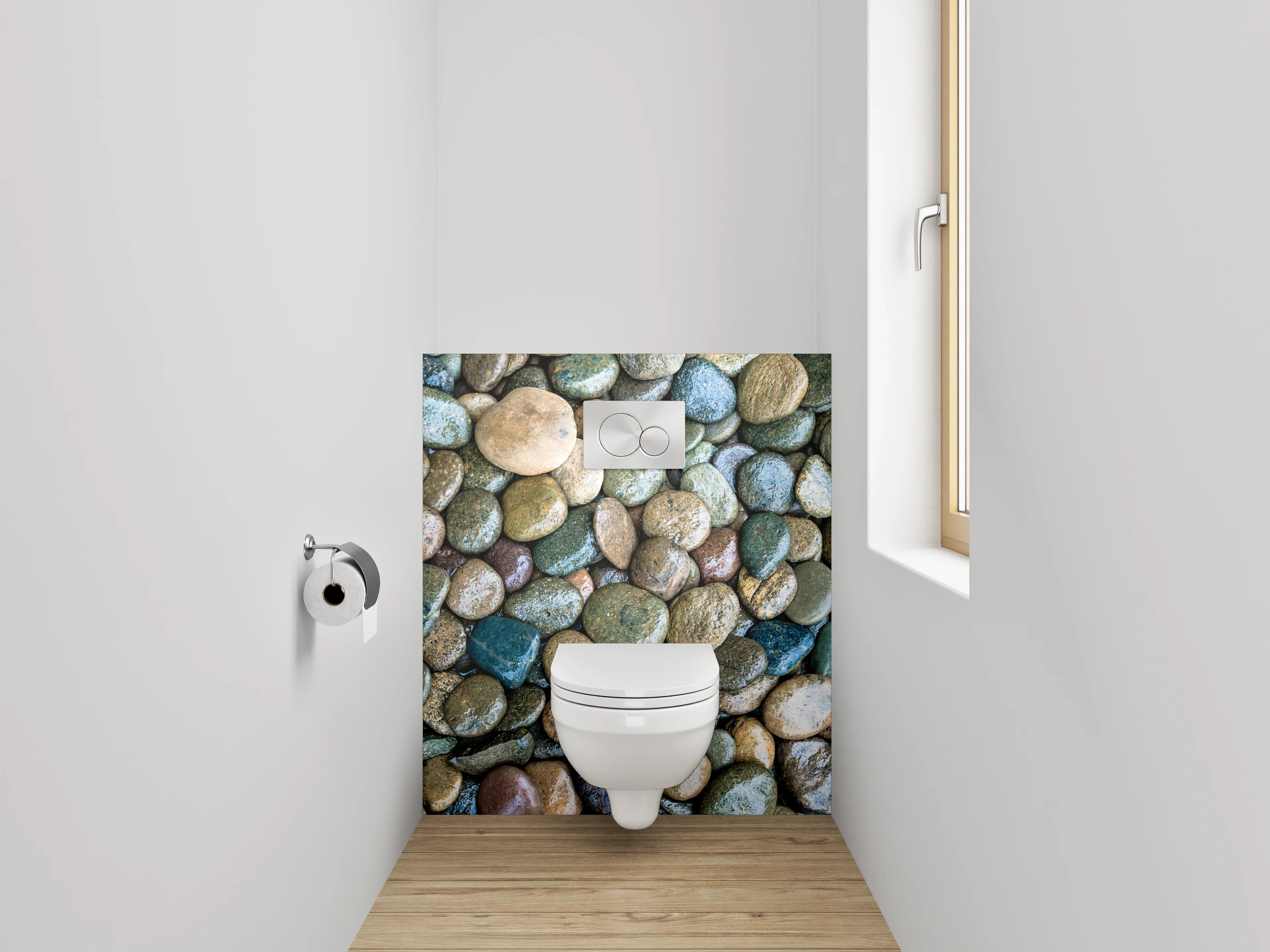 WC-Rückwand - Bunte Kieselsteine auf Kiesbett