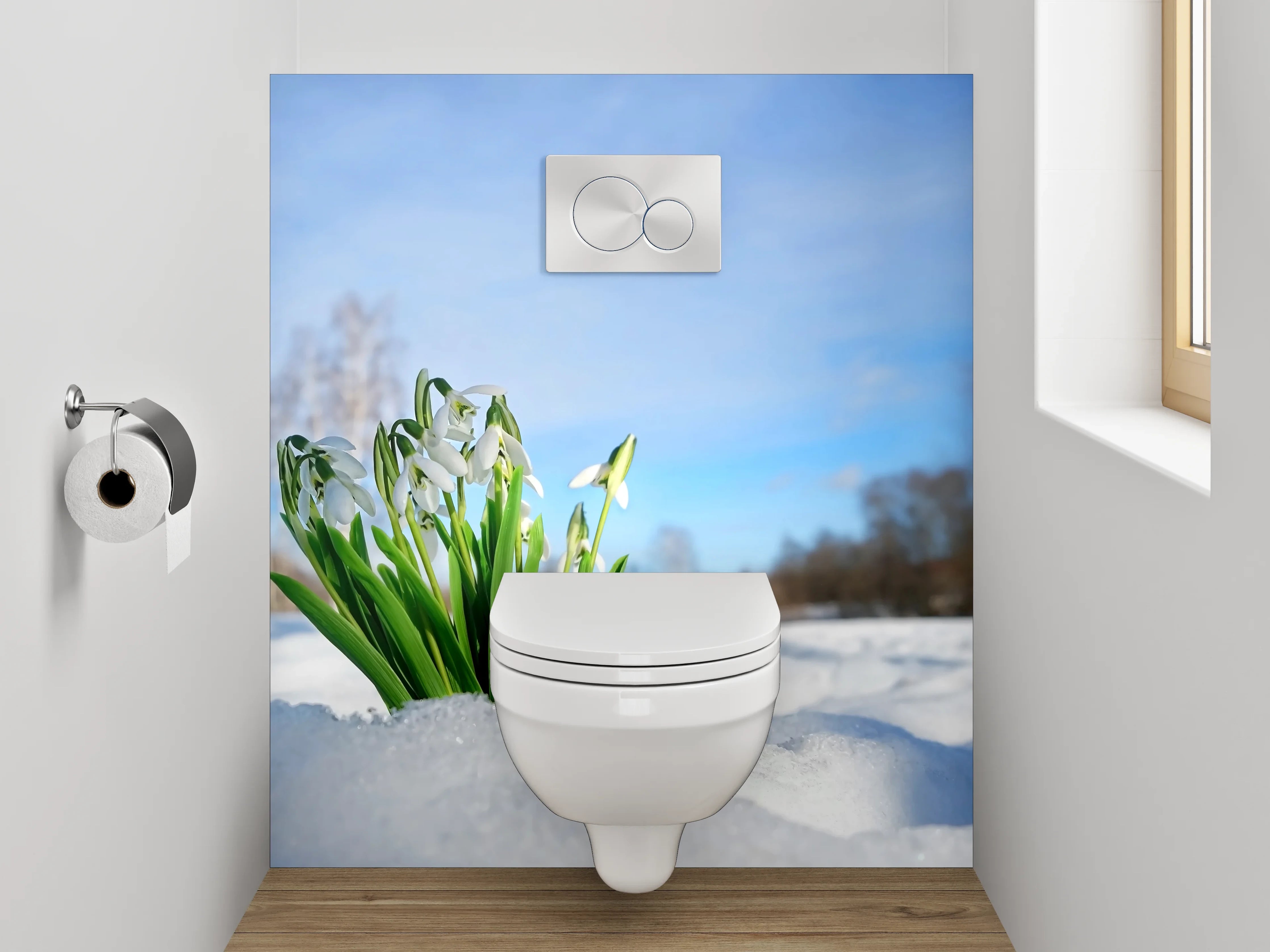WC-Rückwand - Schneeglöckchen im Schnee unter blauem Himmel