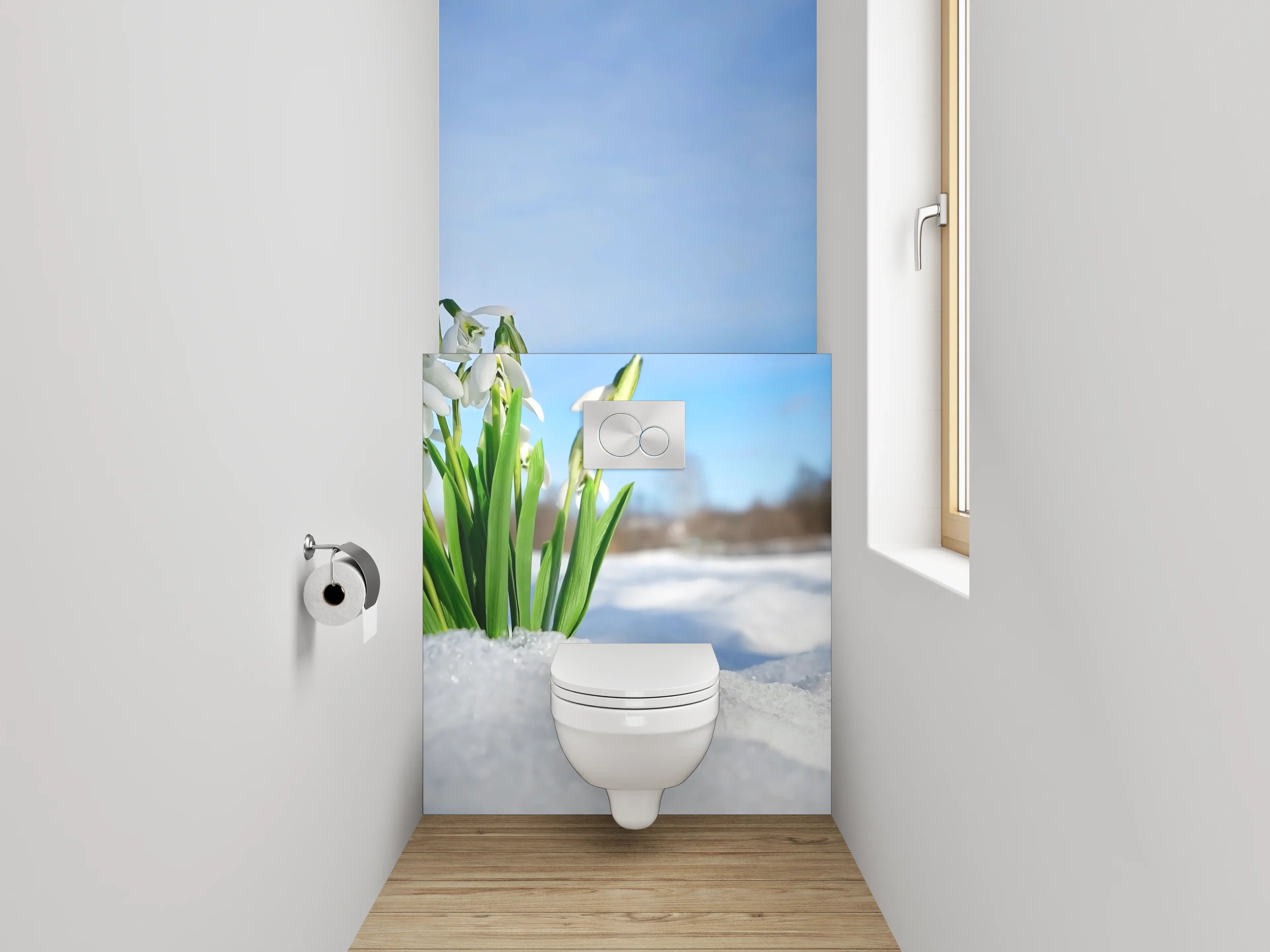 WC-Rückwand - Schneeglöckchen im Schnee unter blauem Himmel
