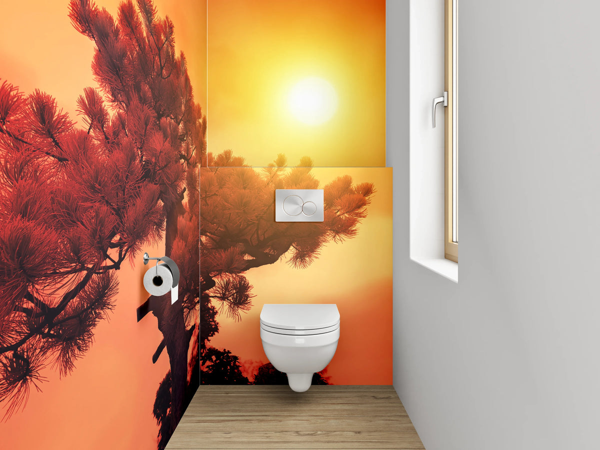 WC-Rückwand - Sonnenuntergang über Kiefernbaum Fotokunst