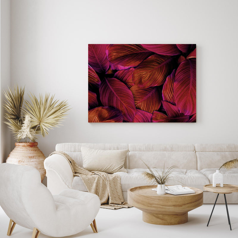 Wandbild -  Spathiphyllum cannifolium - Rosa Blätter in exotisch eingerichtetem Wohnzimmer über gemütlicher Couch