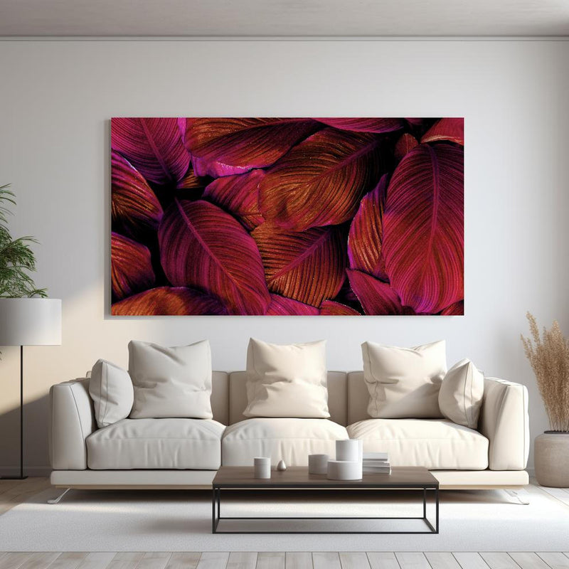 Wandbild -  Spathiphyllum cannifolium - Rosa Blätter hinter sanfter Couch mit cremefarbenen großen Kissen