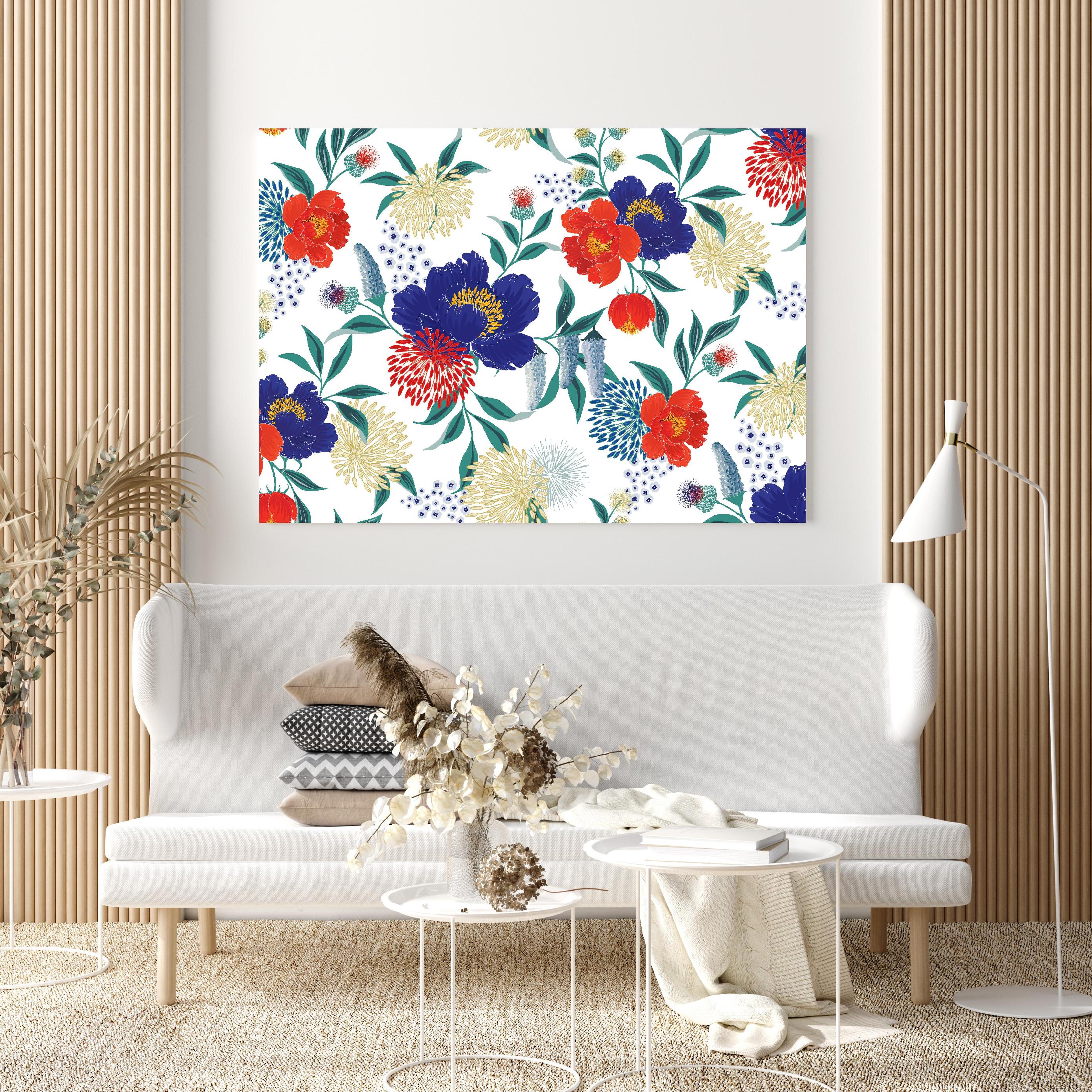 Wandbild - Bunte Blumenmuster Wandtapete Design hinter sanfter Couch mit cremefarbenen großen Kissen Zoom