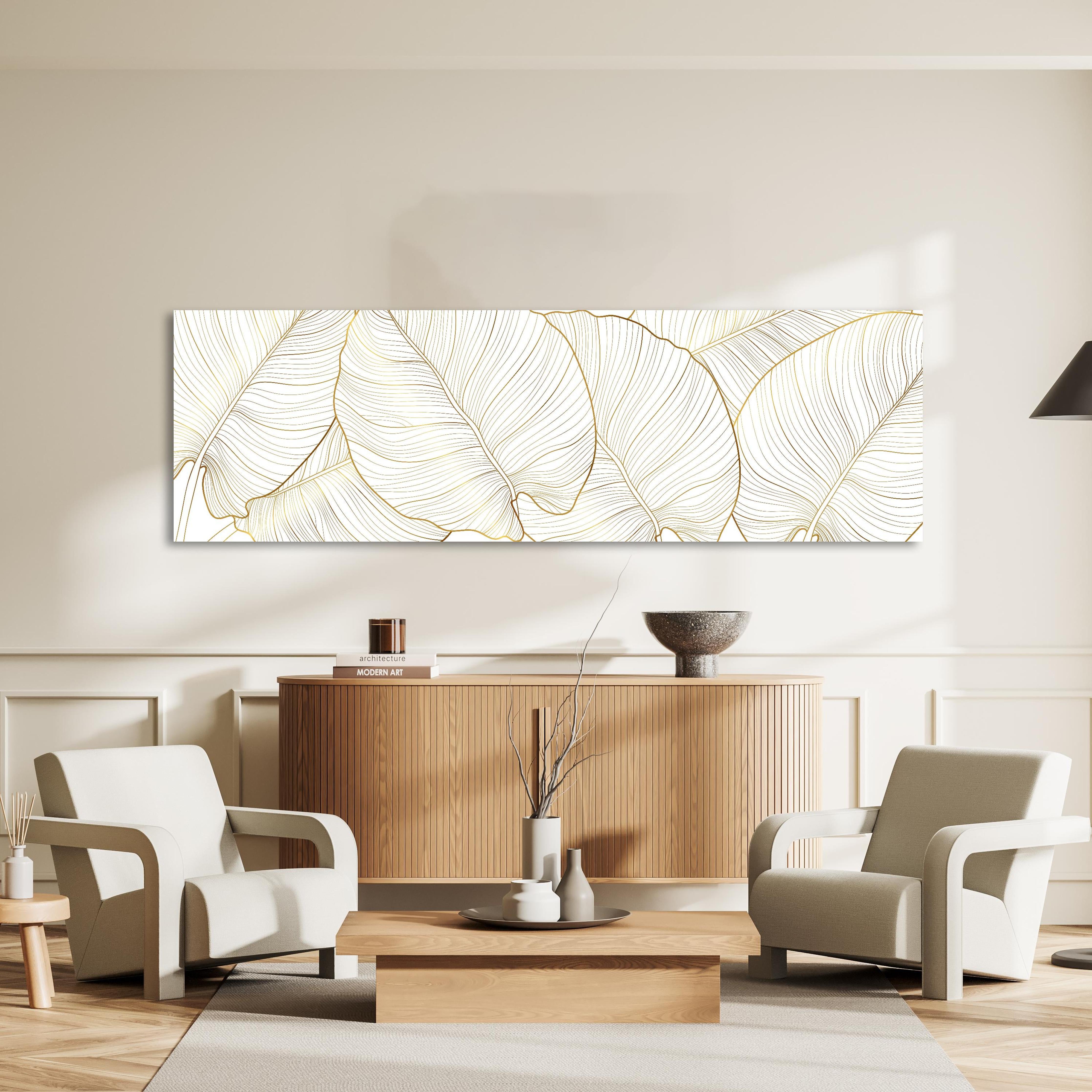Wandbild - Elegantes Blatt-Design in Gold und Weiß in dezentem Wohnzimmer mit geölter Holzkommode Zoom