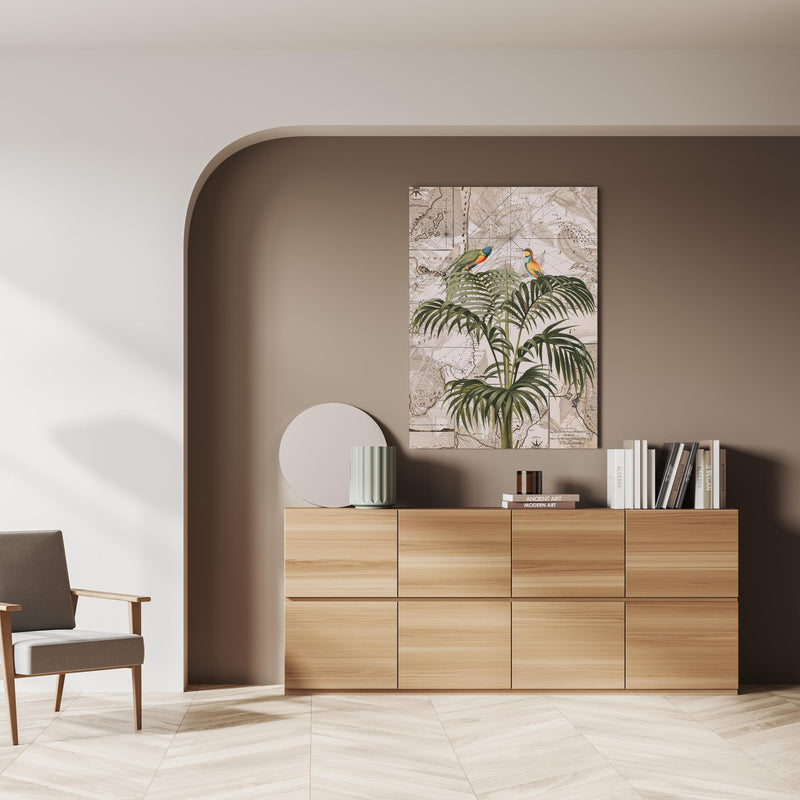Wandbild - Weltkarte - Tropische Pflanze über doppelter Holzkommode mit Vase und Büchersammlung