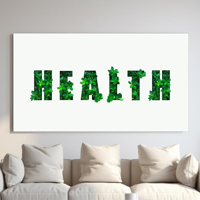Wandbild - Wort HEALTH aus grünen Blättern hinter sanfter Couch mit cremefarbenen großen Kissen Zoom