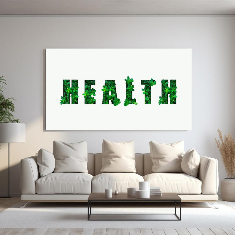 Wandbild - Wort HEALTH aus grünen Blättern hinter sanfter Couch mit cremefarbenen großen Kissen